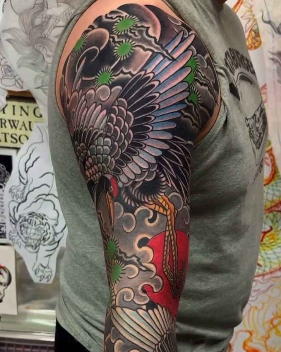 Crane and clouds japanese irezumi tattoo on the forearm by Marcos Rivera, Laredo, Texas