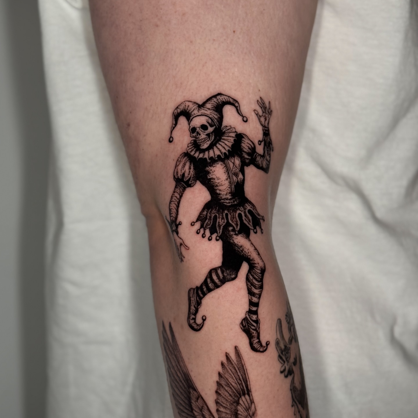 Jester black and grey tattoo on the forearm by Miami Tattoo Artist, Miami, Florida