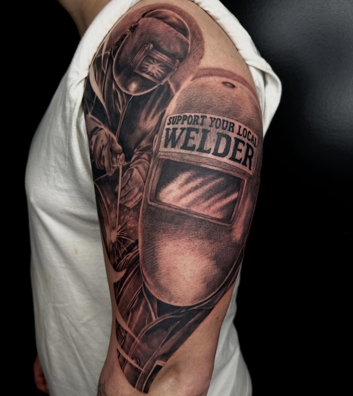 Welder realism tattoo on the forearm by Son Salem