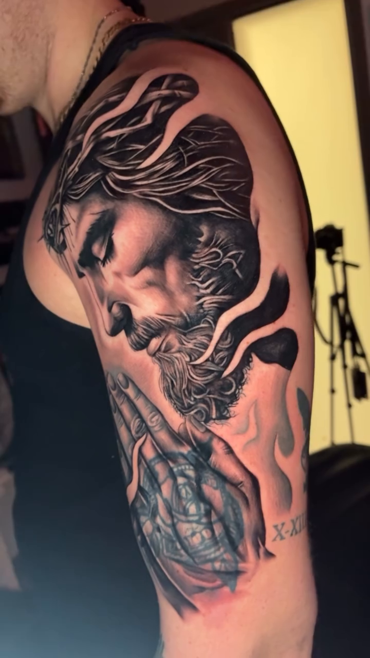 Jesus Christ praying realism tattoo by TattooCrazy🎭