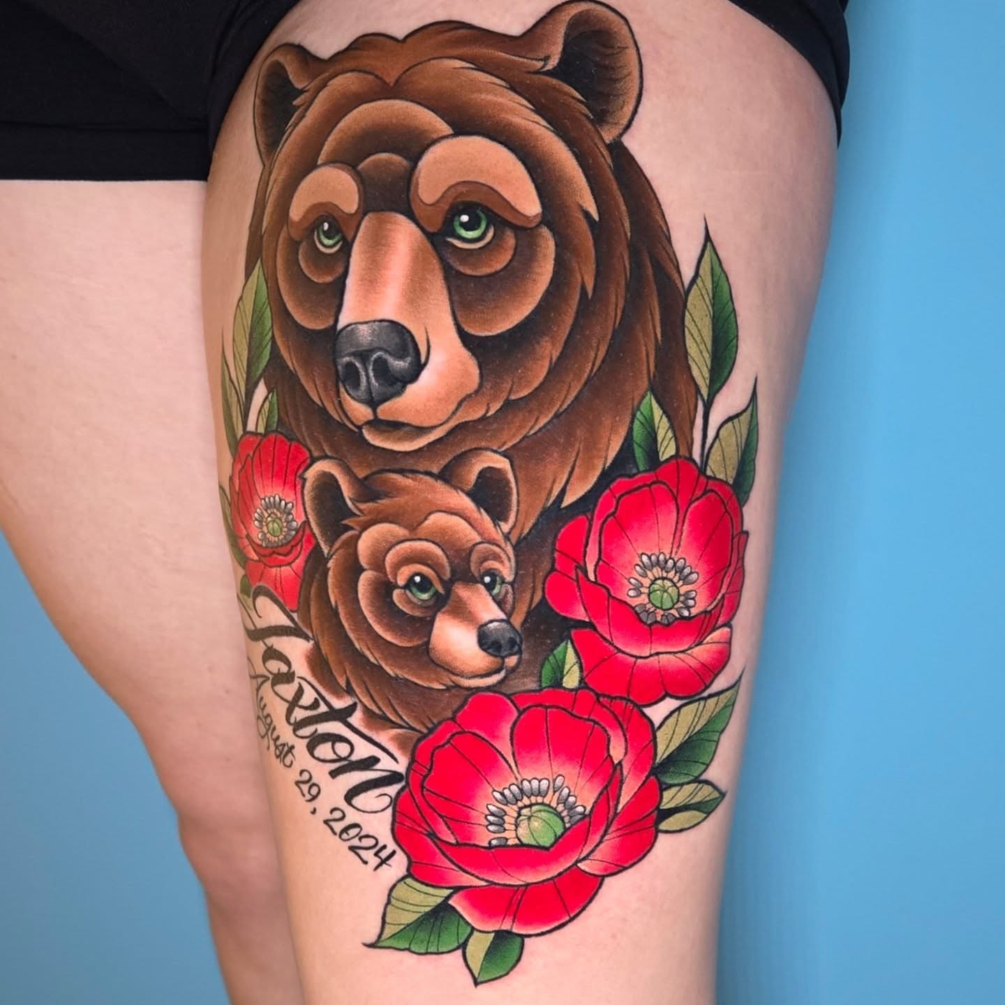 Brown bear and poppies American traditional tattoo on the thigh by Jeff Stager