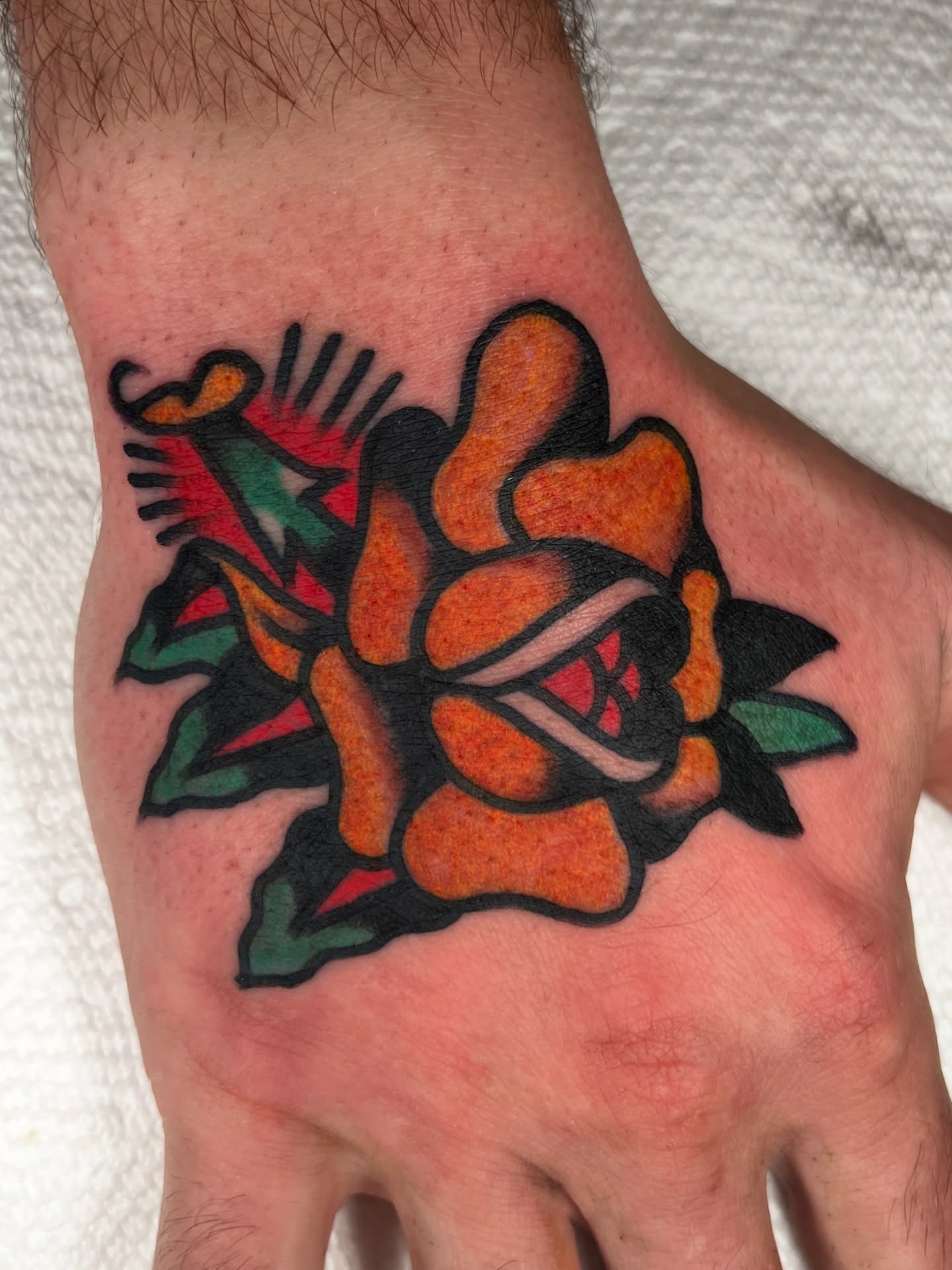 Rose American traditional tattoo on the hand by 💥Jeff Klug💥, Austin, Texas