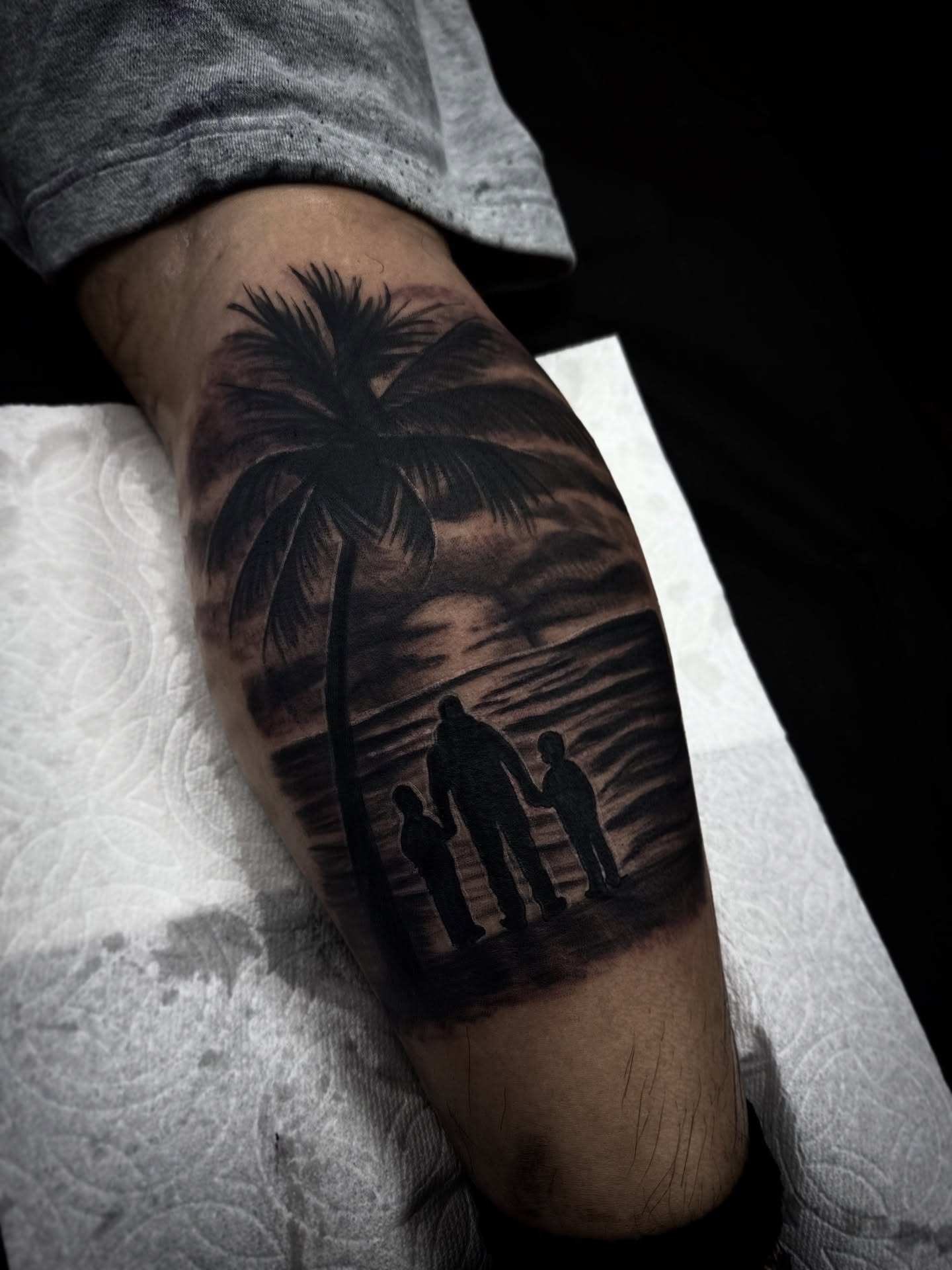 Family silhouette realism tattoo on the forearm by ♟️SouthEastLA♟️