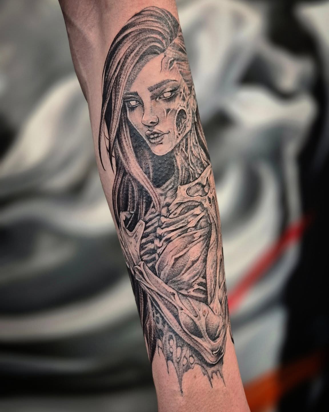 Woman with exposed ribcage realism tattoo on the forearm by Тату Херсон _ Kherson tattoo, Kherson