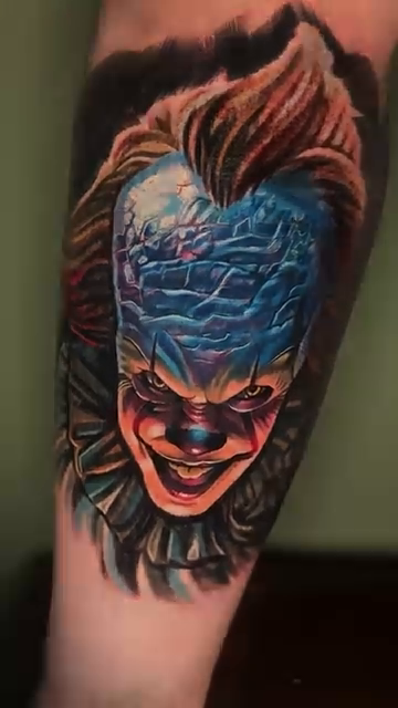 Pennywise the clown realism tattoo by Javier Rivera