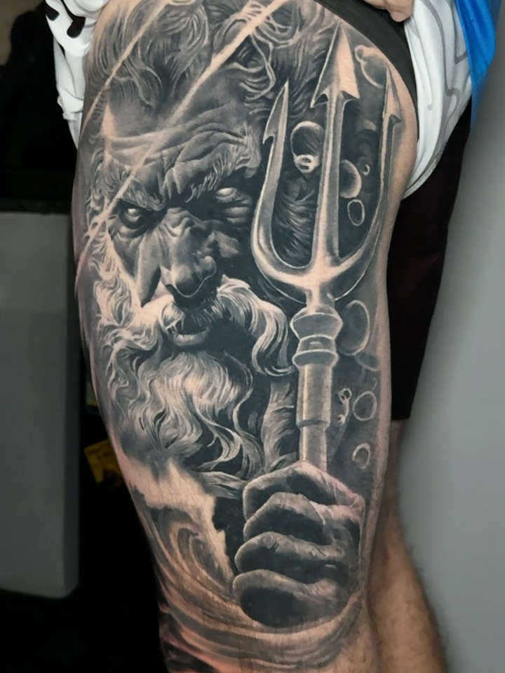 God-like figure realism tattoo on the forearm by Arthur Volper