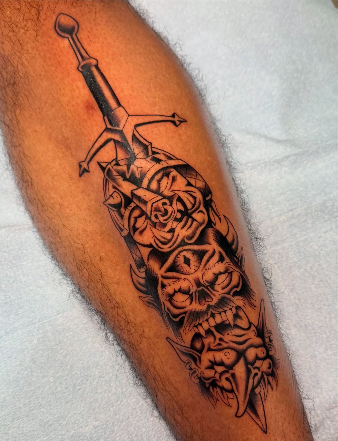 Tattoo by @_lazy.bones_ — black_and_grey, dark_realism
