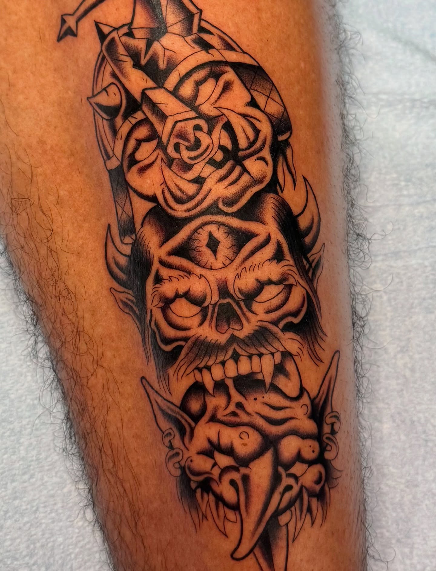 Tattoo by @_lazy.bones_ — black_and_grey, dark_realism
