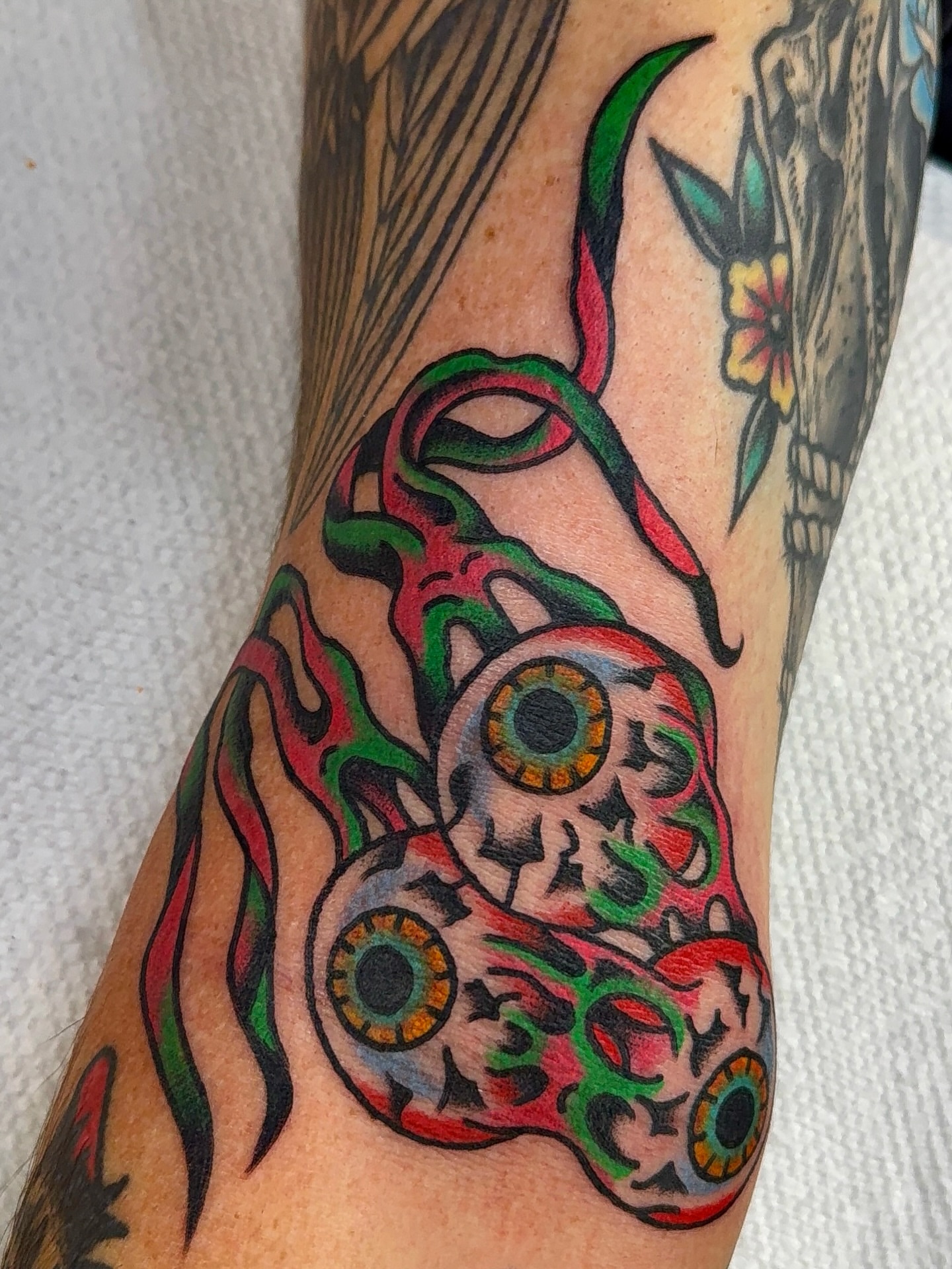 Skull with eyes Chicano tattoo on the forearm by VAY