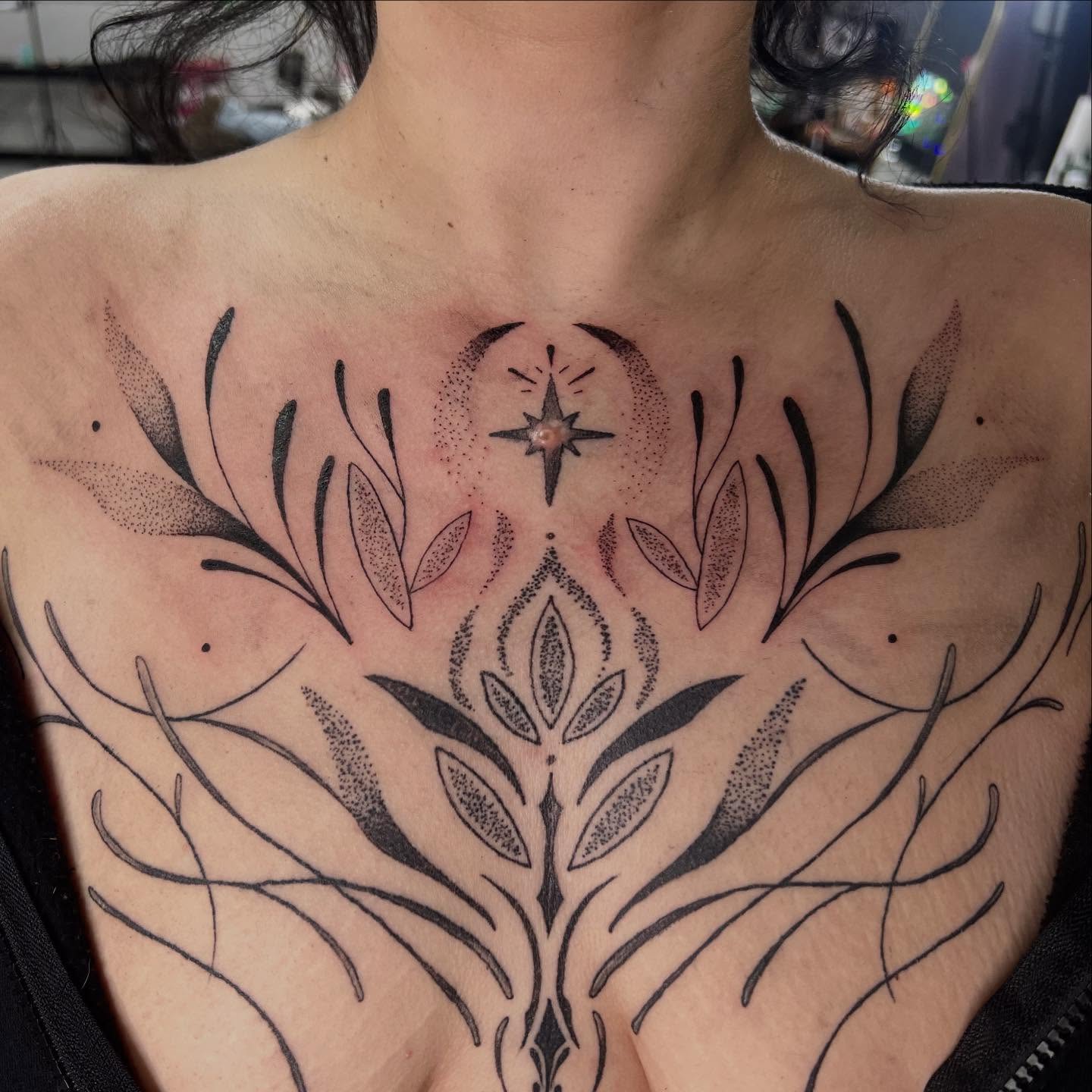 Abstract floral design dotwork tattoo on the chest by Kahlan ⍟