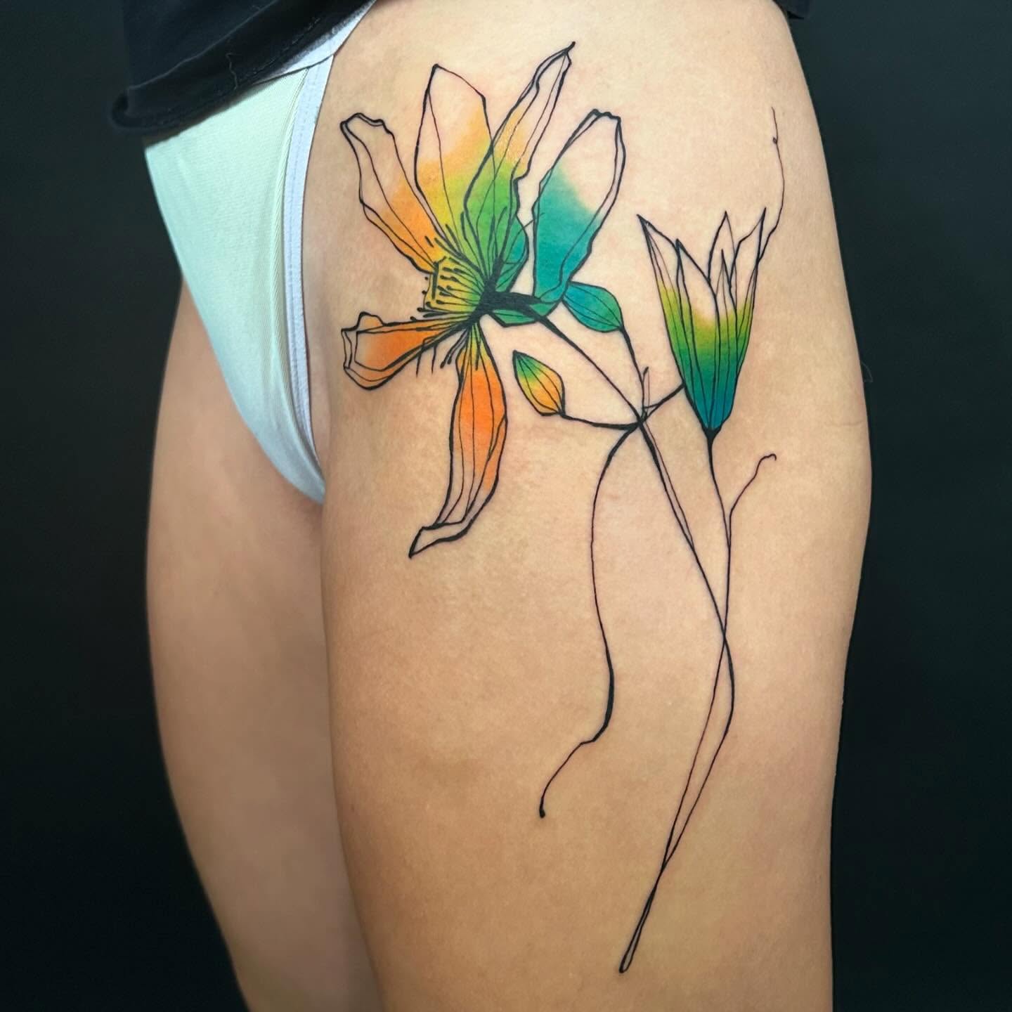 Abstract floral watercolor tattoo on the thigh by @laurabochet_tattoo, Beacon, NY