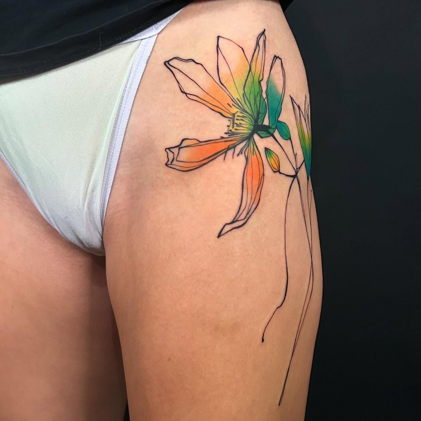 Abstract flower watercolor tattoo on the thigh by @laurabochet_tattoo, Beacon, NY