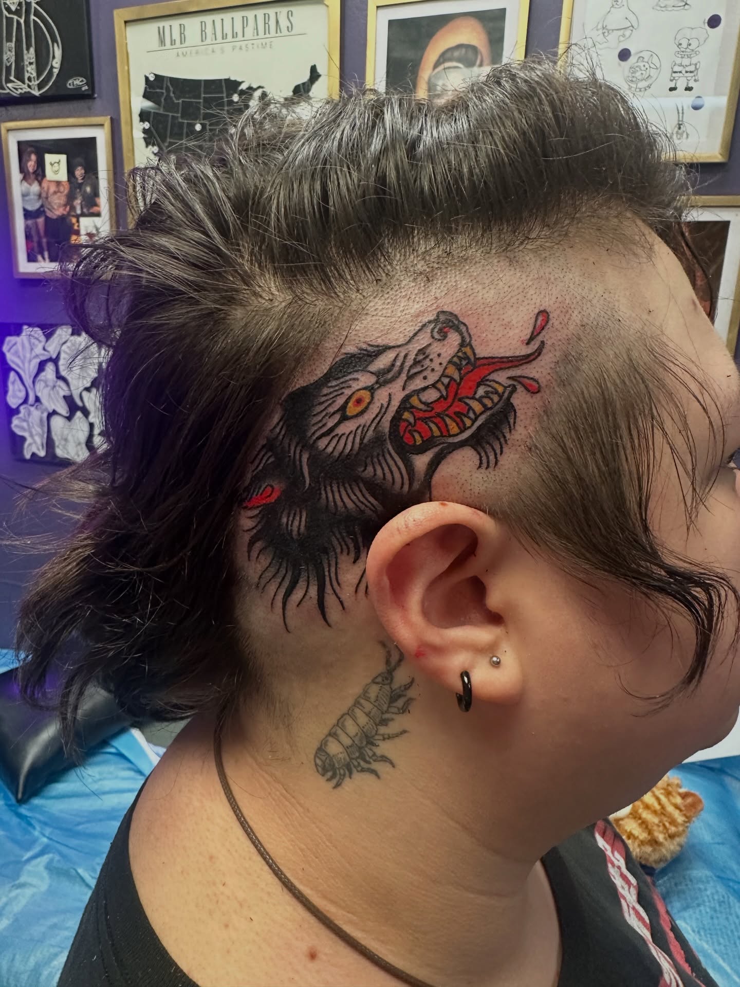 Wolf American traditional tattoo on the neck by Carly🪲 greensboro tattoo artist, Greensboro, North Carolina