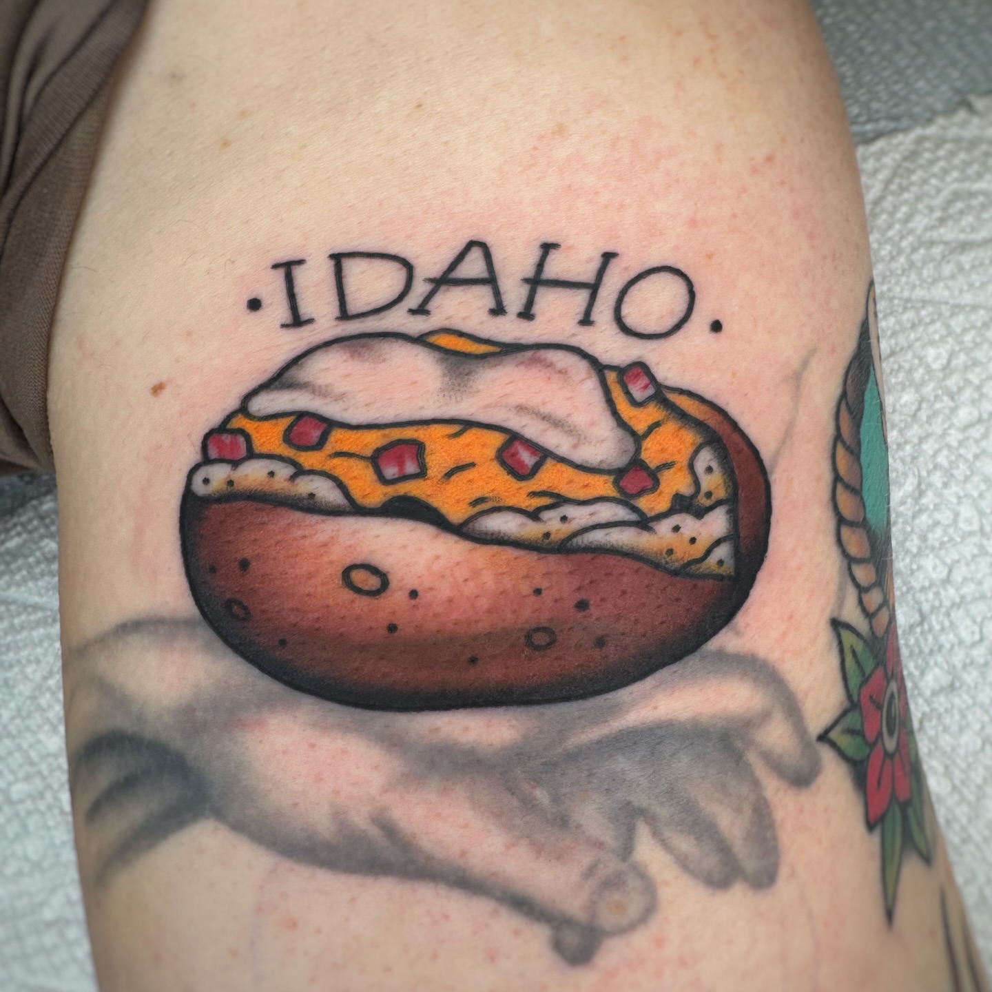 Idaho American traditional tattoo on the thigh by Cori James Tattoo Artist