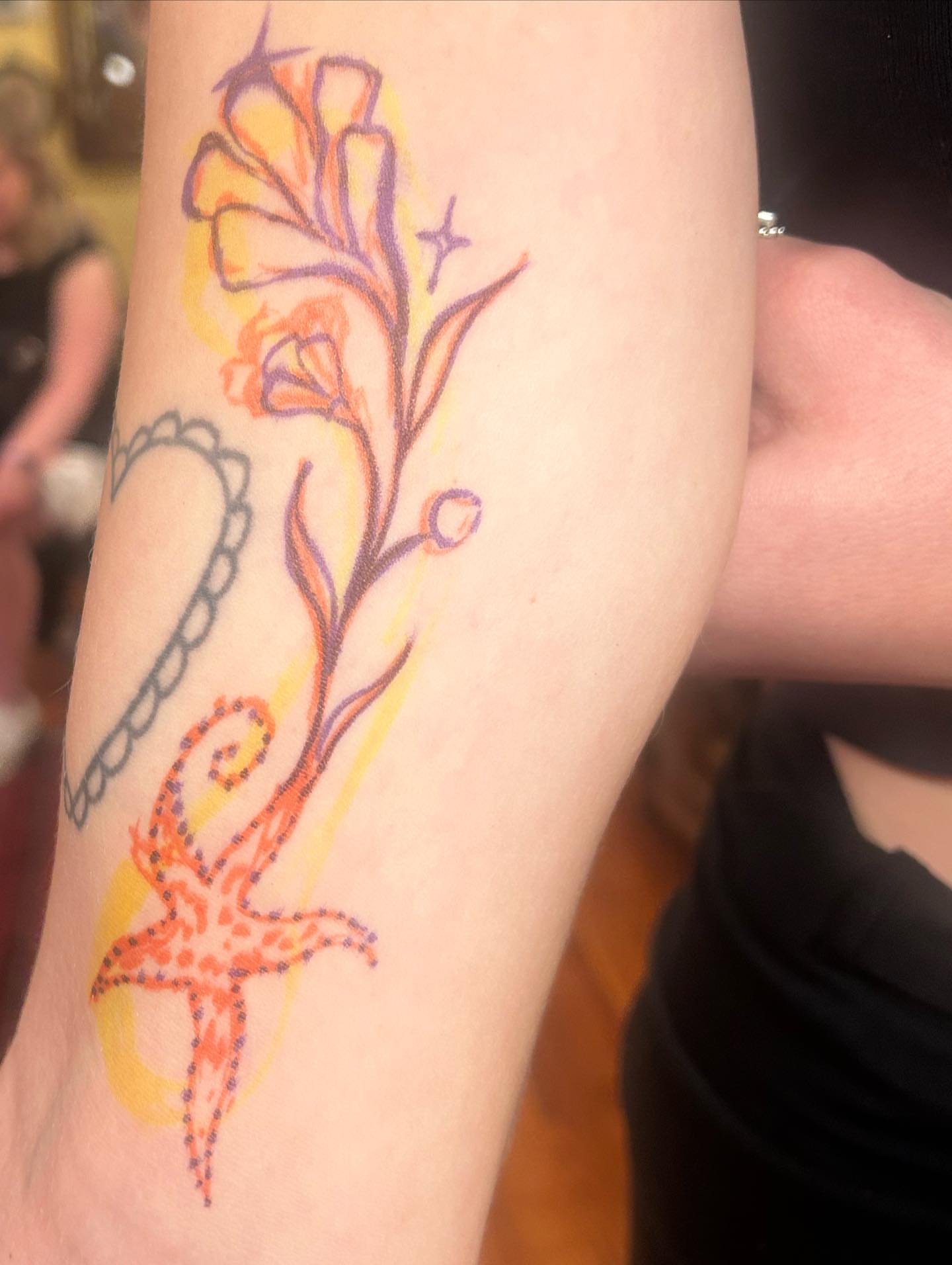 Flower and starfish dotwork tattoo on the forearm by ✧✦ ☻ ✦✧