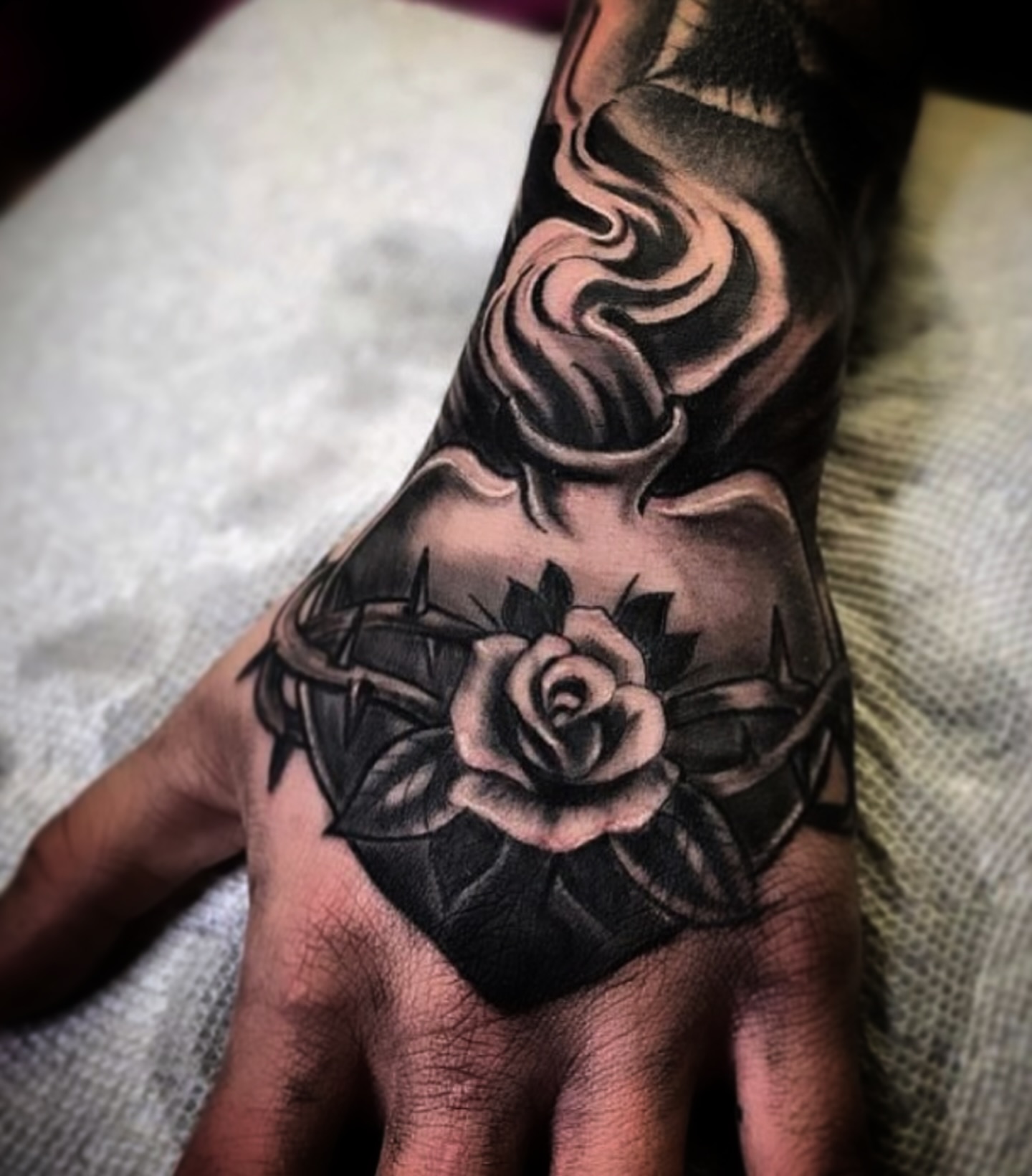 Rose and crown black and grey tattoo on the hand by ♟️SouthEastLA♟️