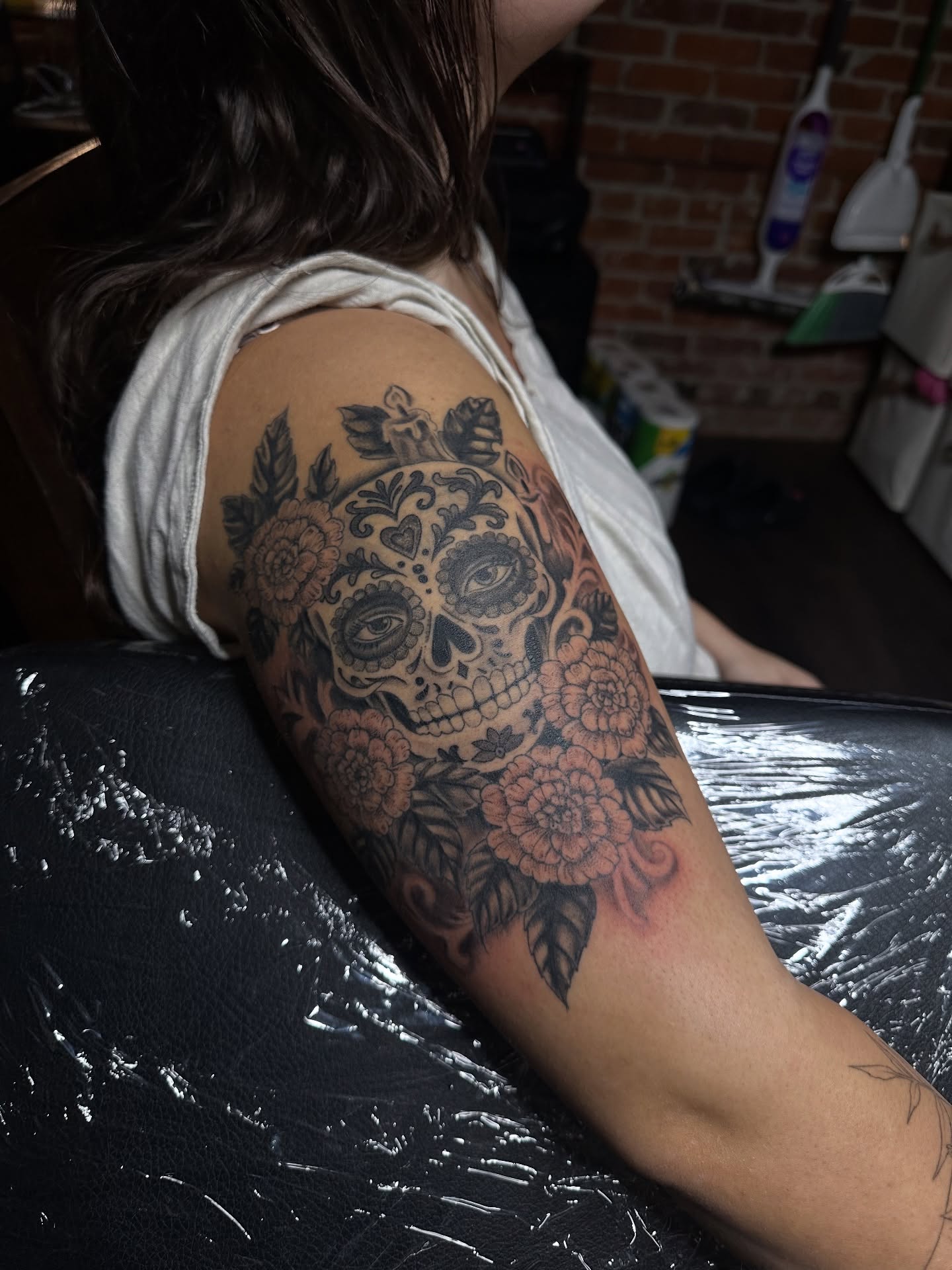 Sugar skull with floral elements Chicano tattoo on the shoulder by แดแด ๐ฎ๐ท ๐ฆ๐ซ