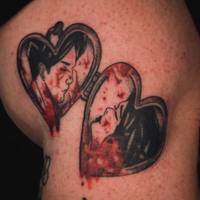 Heart couple black and grey tattoo on the shoulder by allison