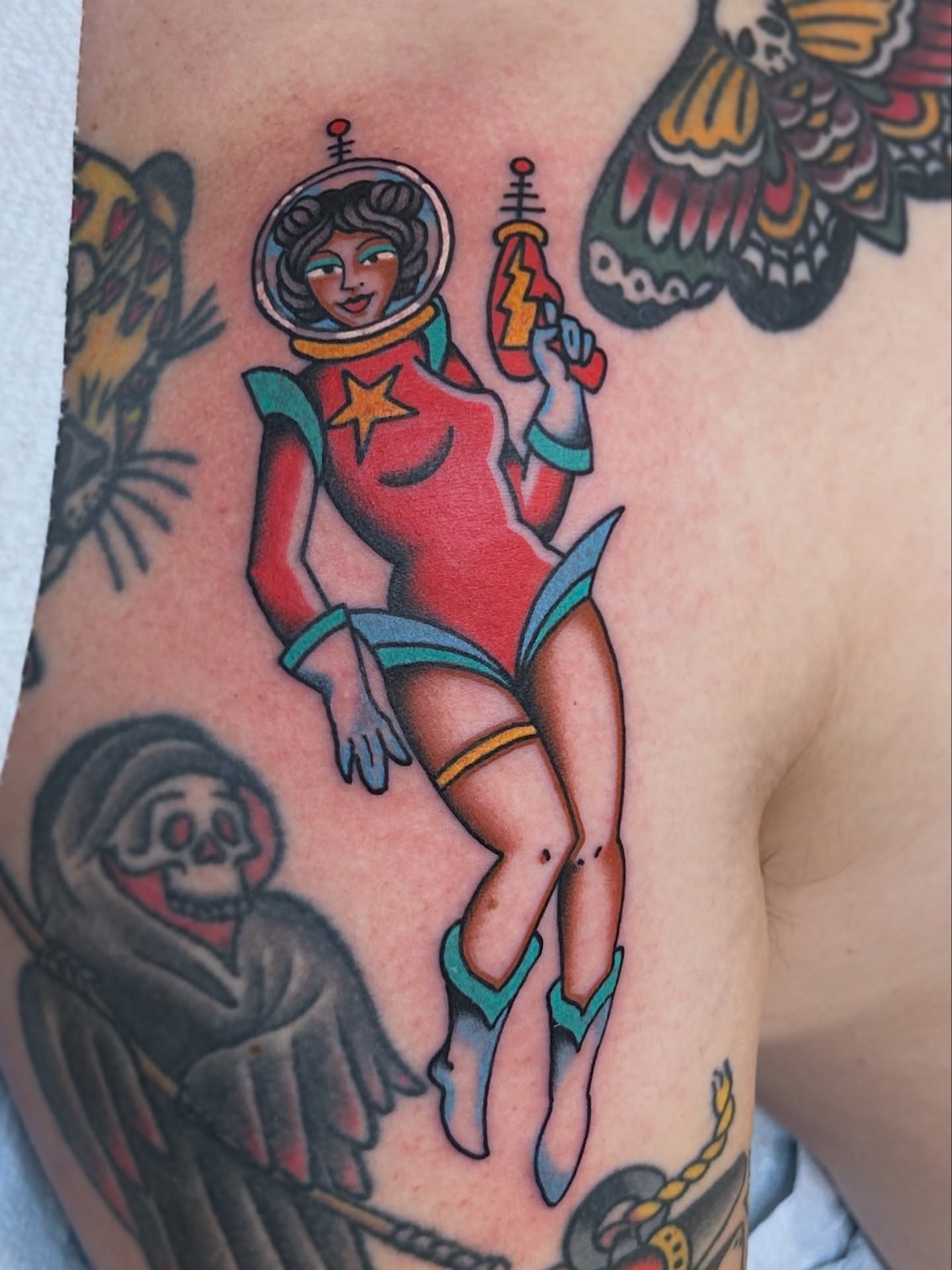 Cosmic woman American traditional tattoo on the thigh by Lauren Alexandra