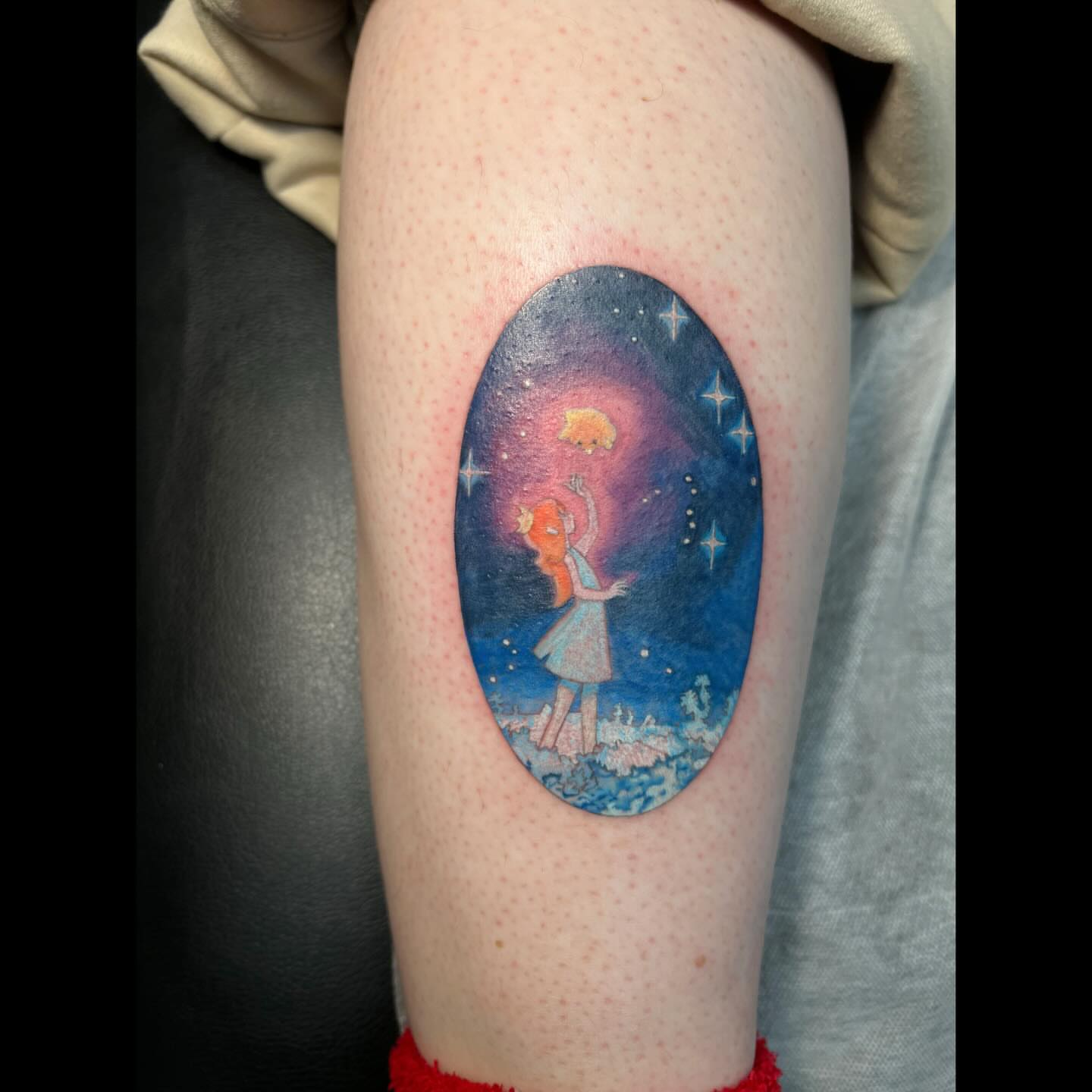 Astronaut girl watercolor tattoo on the thigh by Ali, Cedar Rapids, Iowa