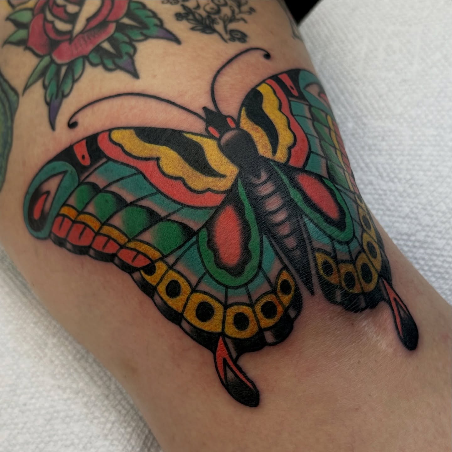 Butterfly American traditional tattoo on the forearm by Amanda Bonhomme, Las Vegas, Nevada