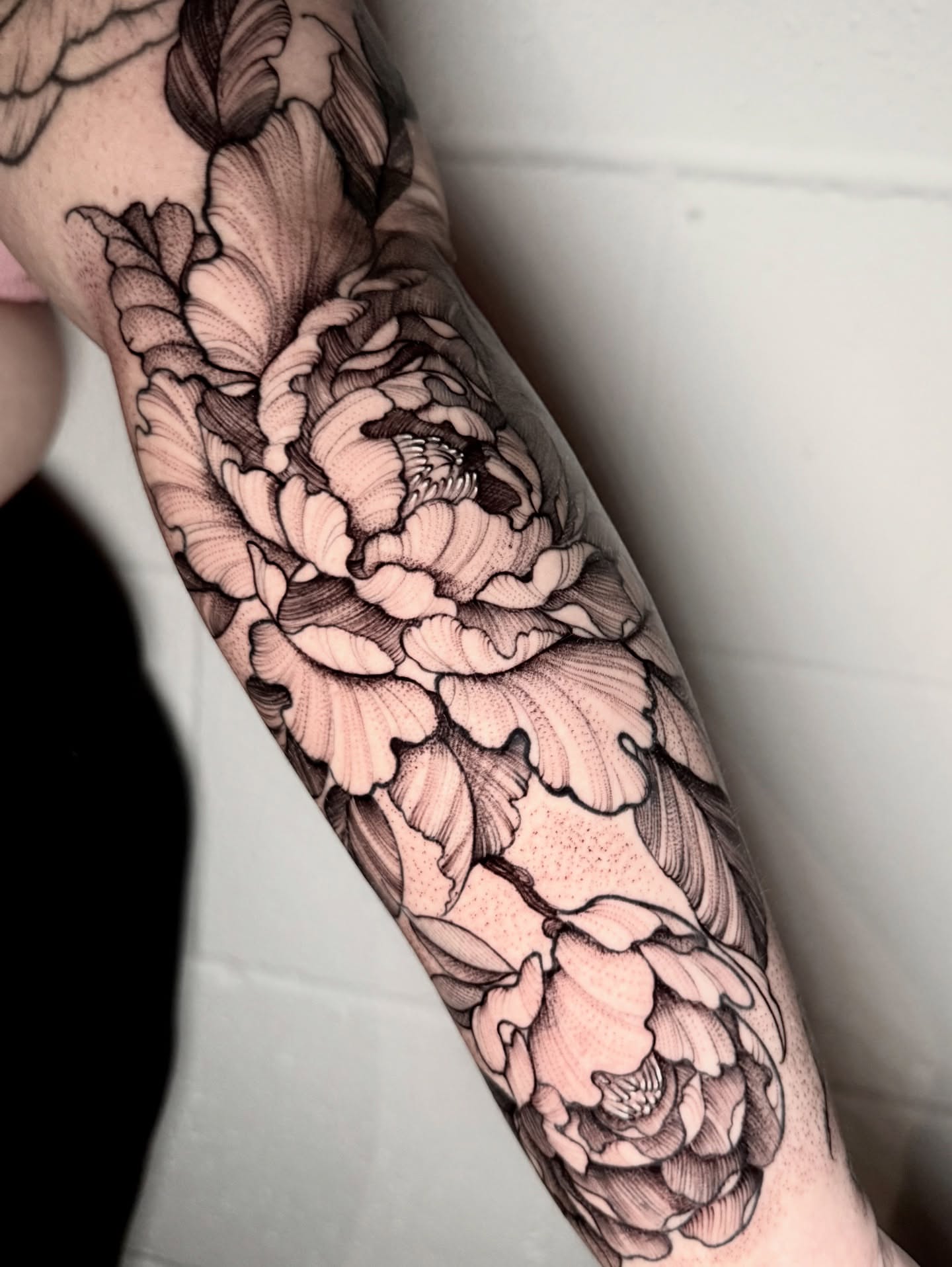 Peony black and grey tattoo on the forearm by ℳ𝒾𝓇𝓉𝒽𝒶 𝒯ℴ𝓇𝓇ℯ𝓈, San Diego, California
