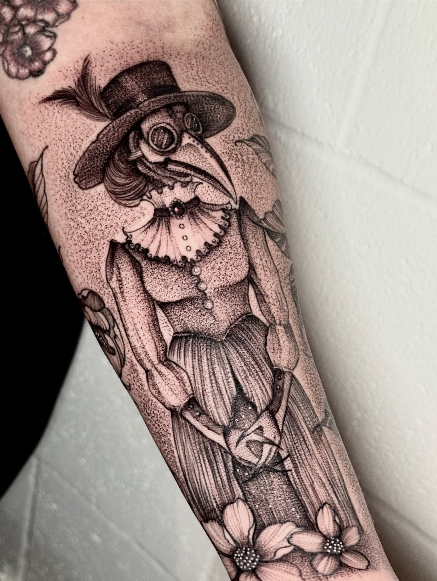 Plague doctor dotwork tattoo on the forearm by ℳ𝒾𝓇𝓉𝒽𝒶 𝒯ℴ𝓇𝓇ℯ𝓈, San Diego, California