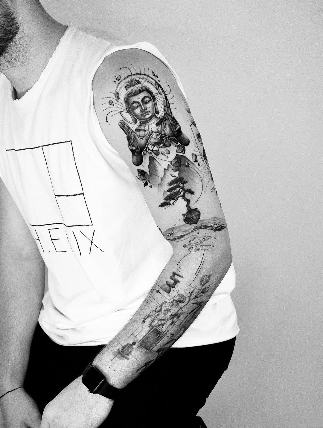Buddha statue realism tattoo on the forearm by János Bozóki, Budapest, Hungary