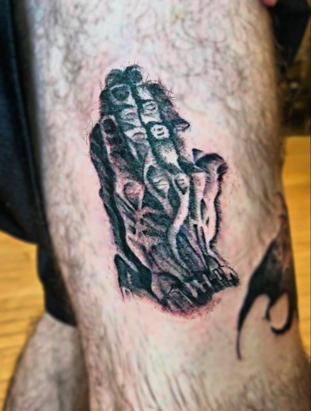 Tattoo by @sebastiana_sangre — dark_realism, black_and_grey