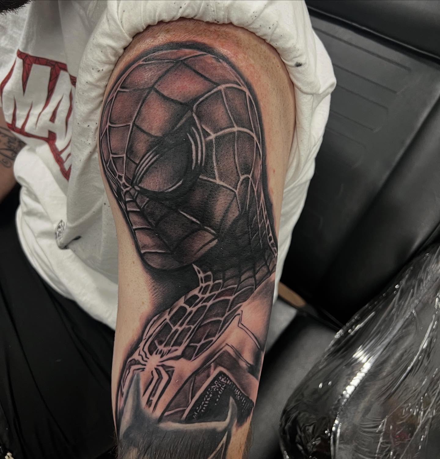 Tattoo by @shamrock_ink — realism, black_and_grey