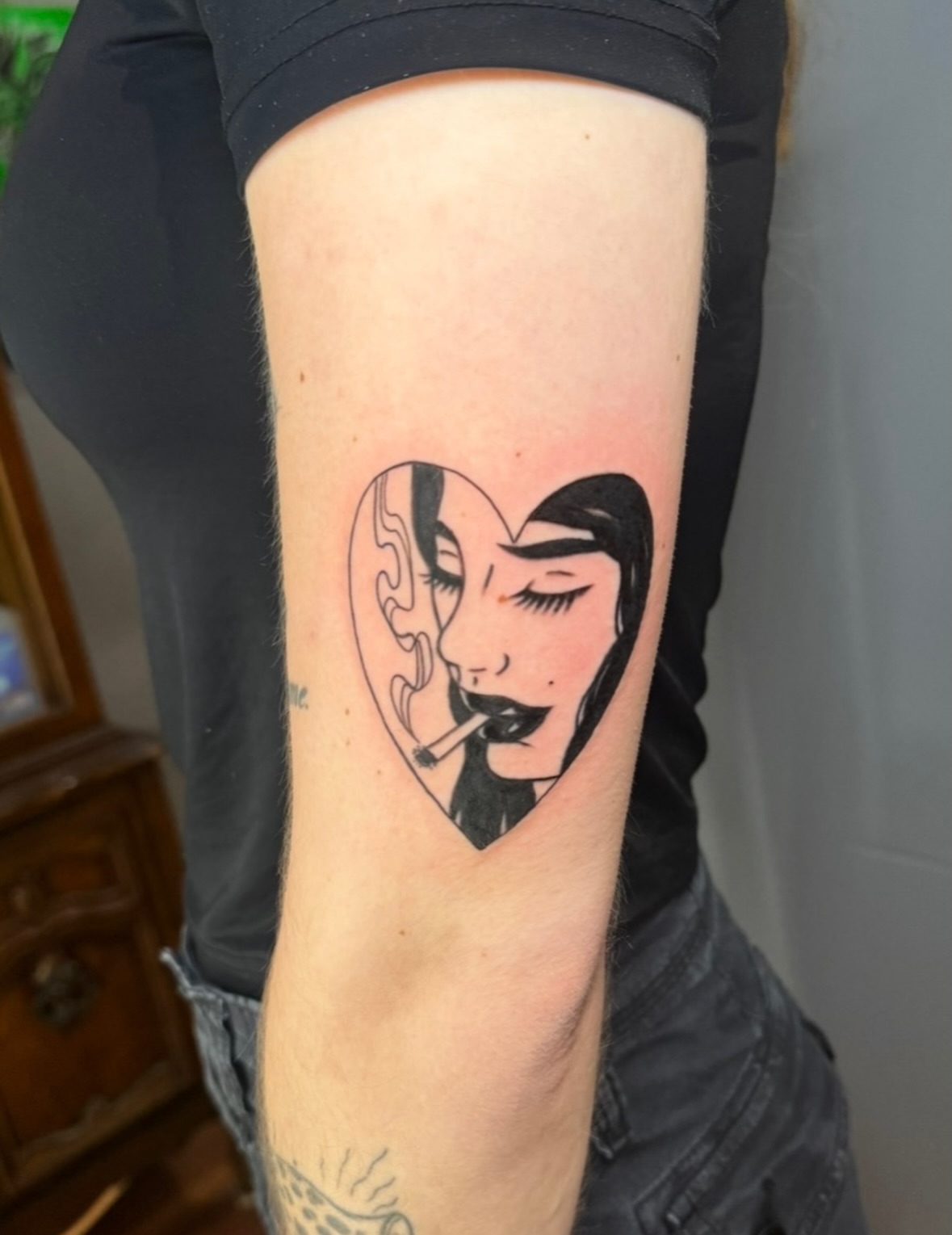Smoking woman black and grey tattoo on the forearm by East Coast Rico
