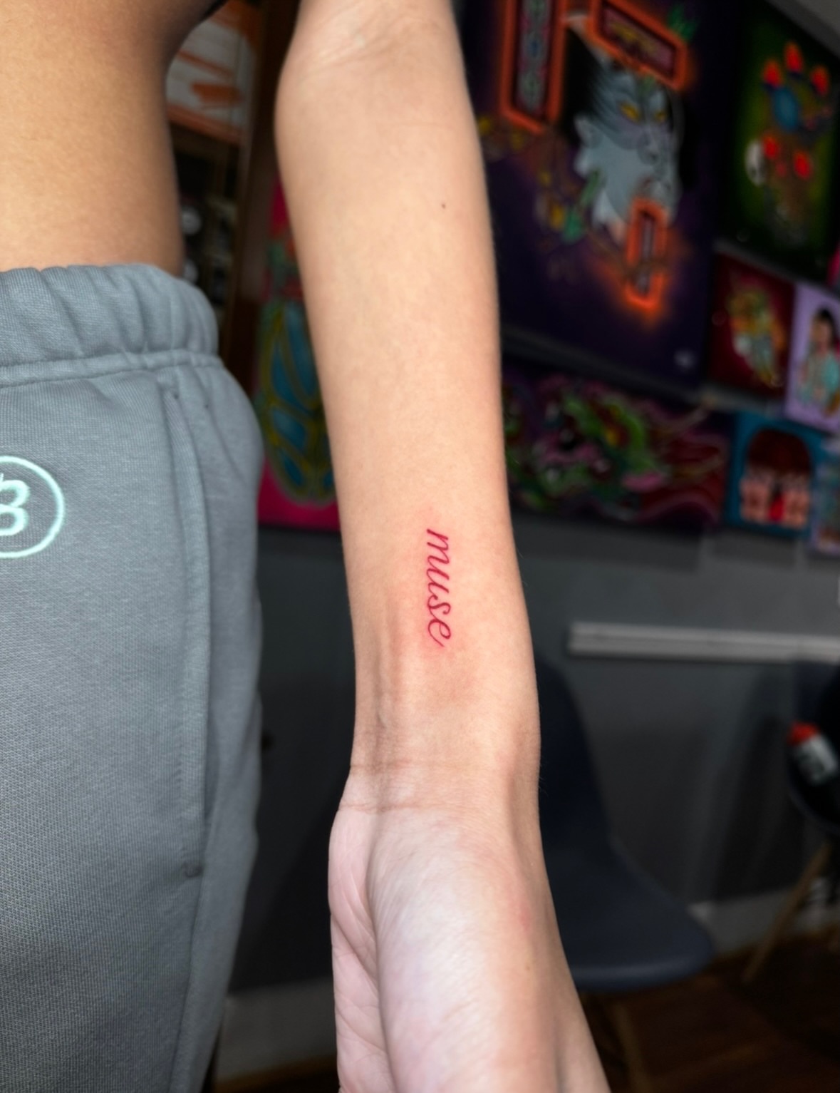 Muse lettering script tattoo on the forearm by East Coast Rico