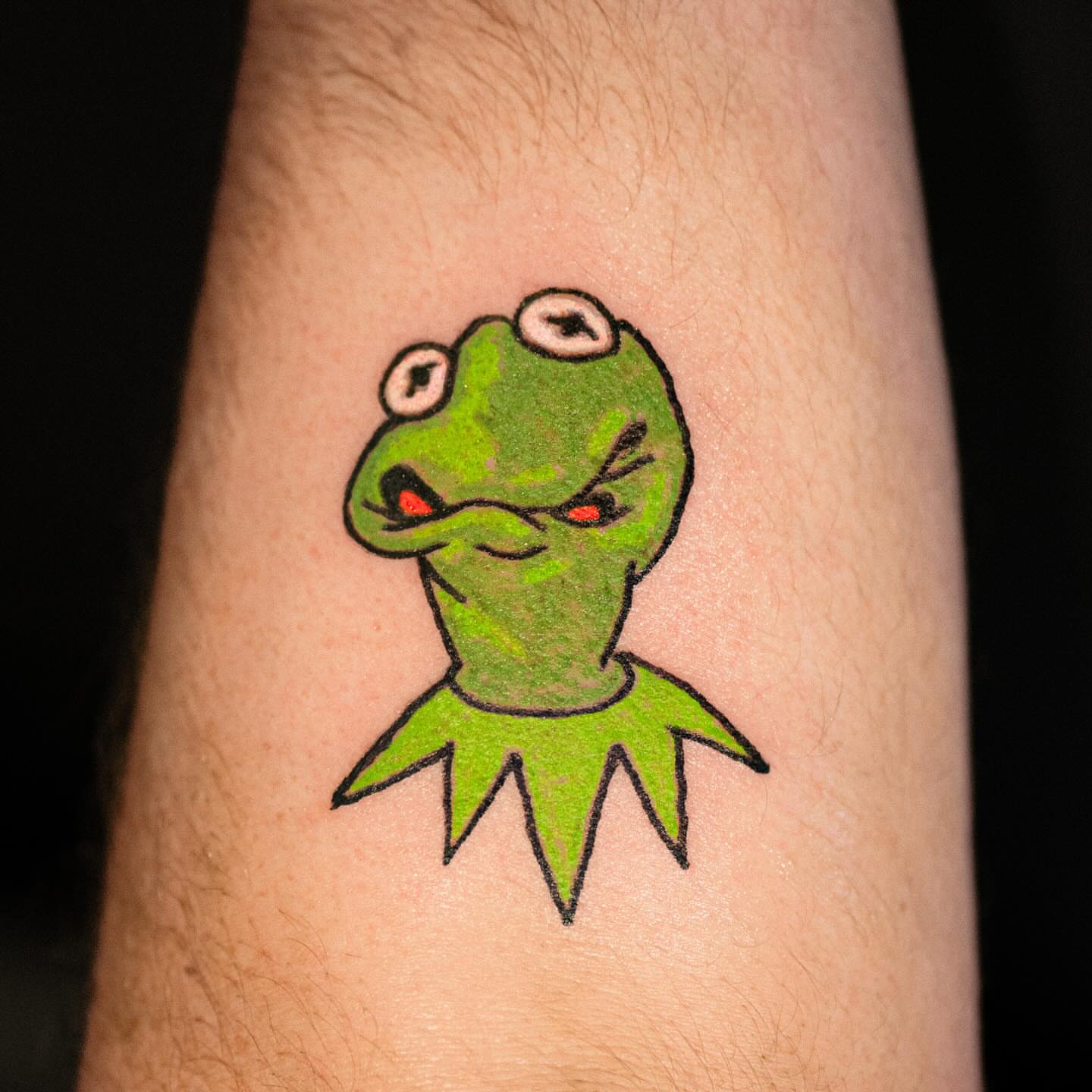 Kermit the frog illustrative tattoo on the forearm by Flash Boom Bang Tattoo