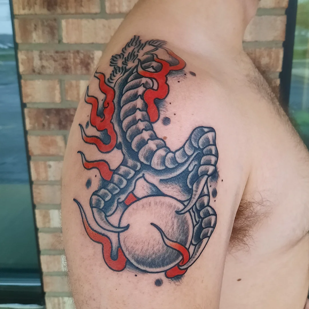 Scorpion American traditional tattoo on the shoulder by Kaetlyn