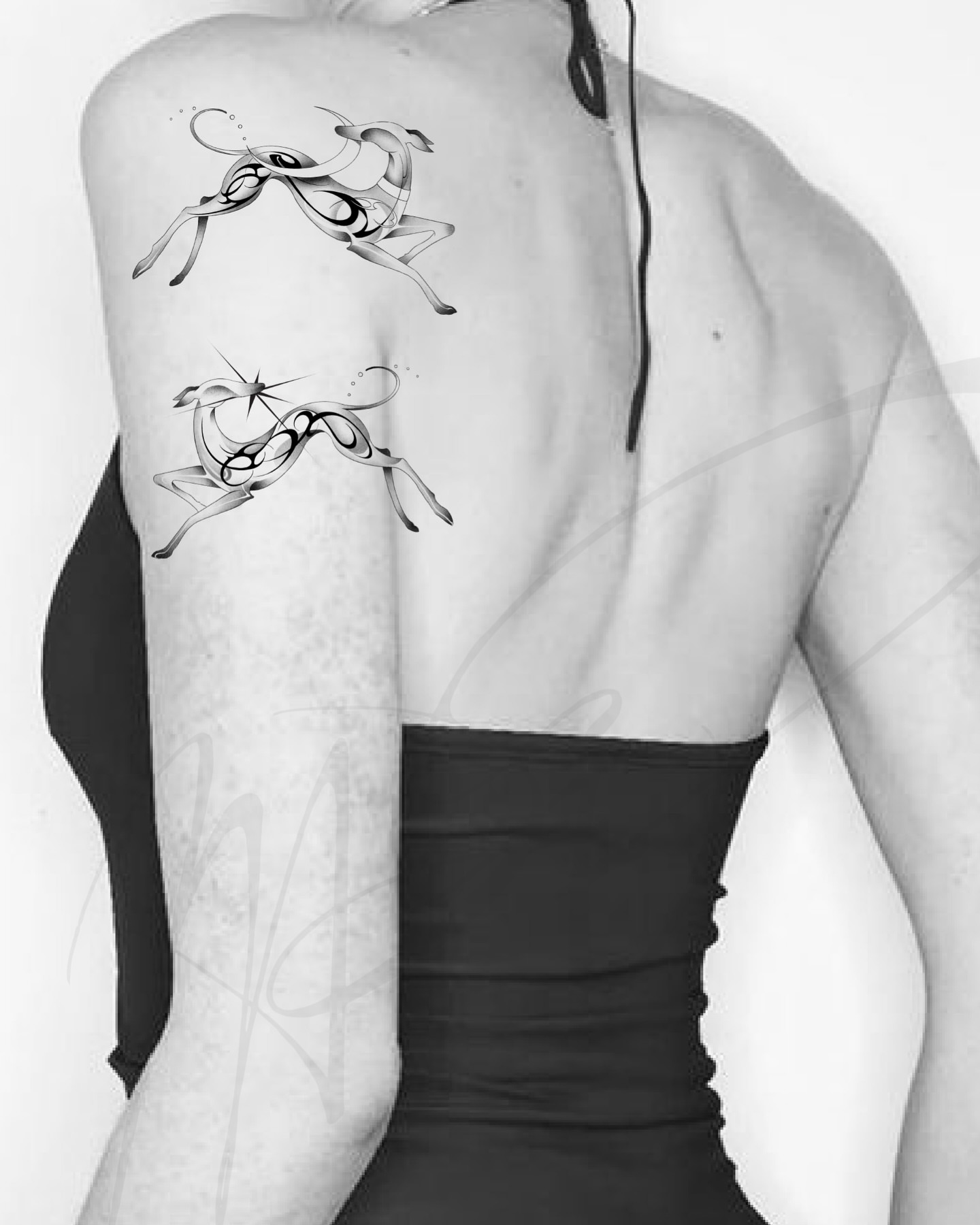 Leaping deer black and grey tattoo on the back by Max