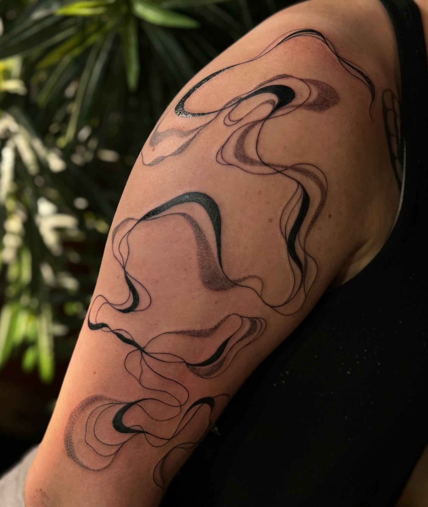 Abstract waves black and grey tattoo on the upper arm by ꧁꧁Hayley꧂꧂