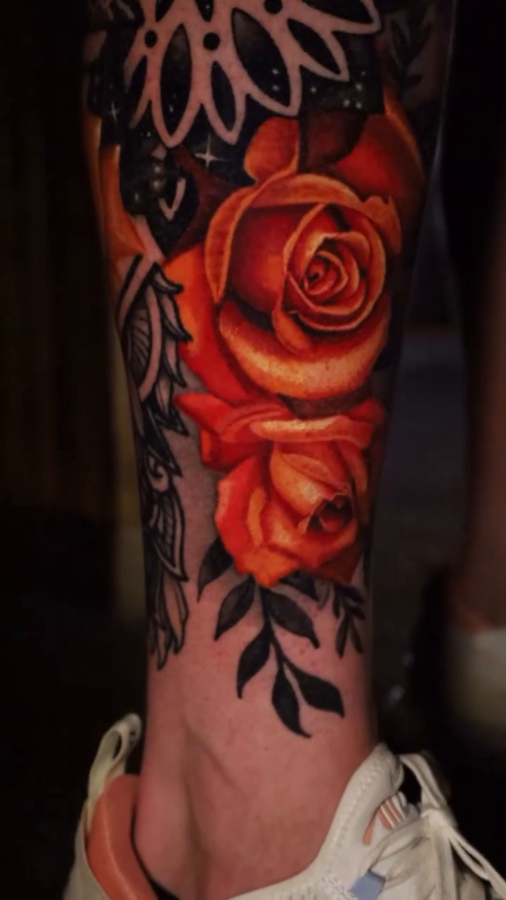 Roses and sword realism tattoo by Bryan Palacios