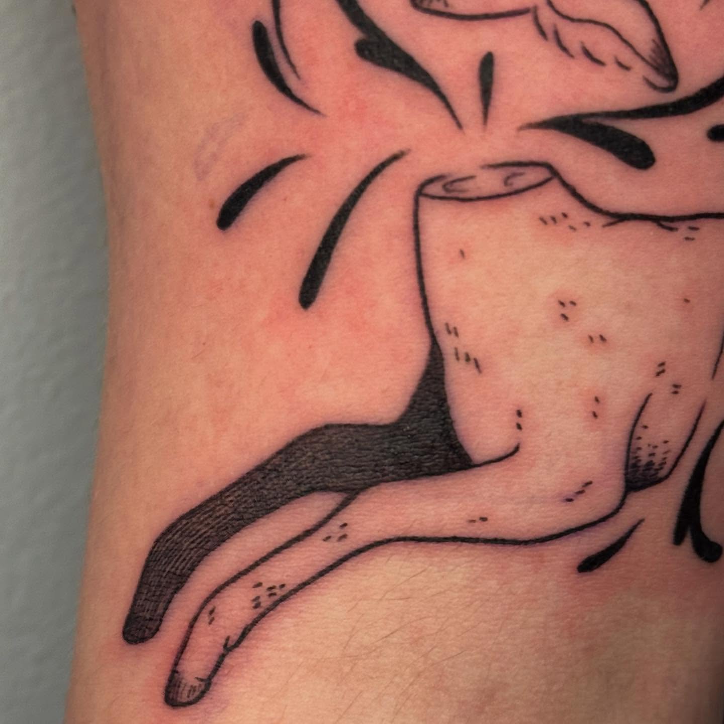 Coffee cup black and grey tattoo on the forearm by Ivy
