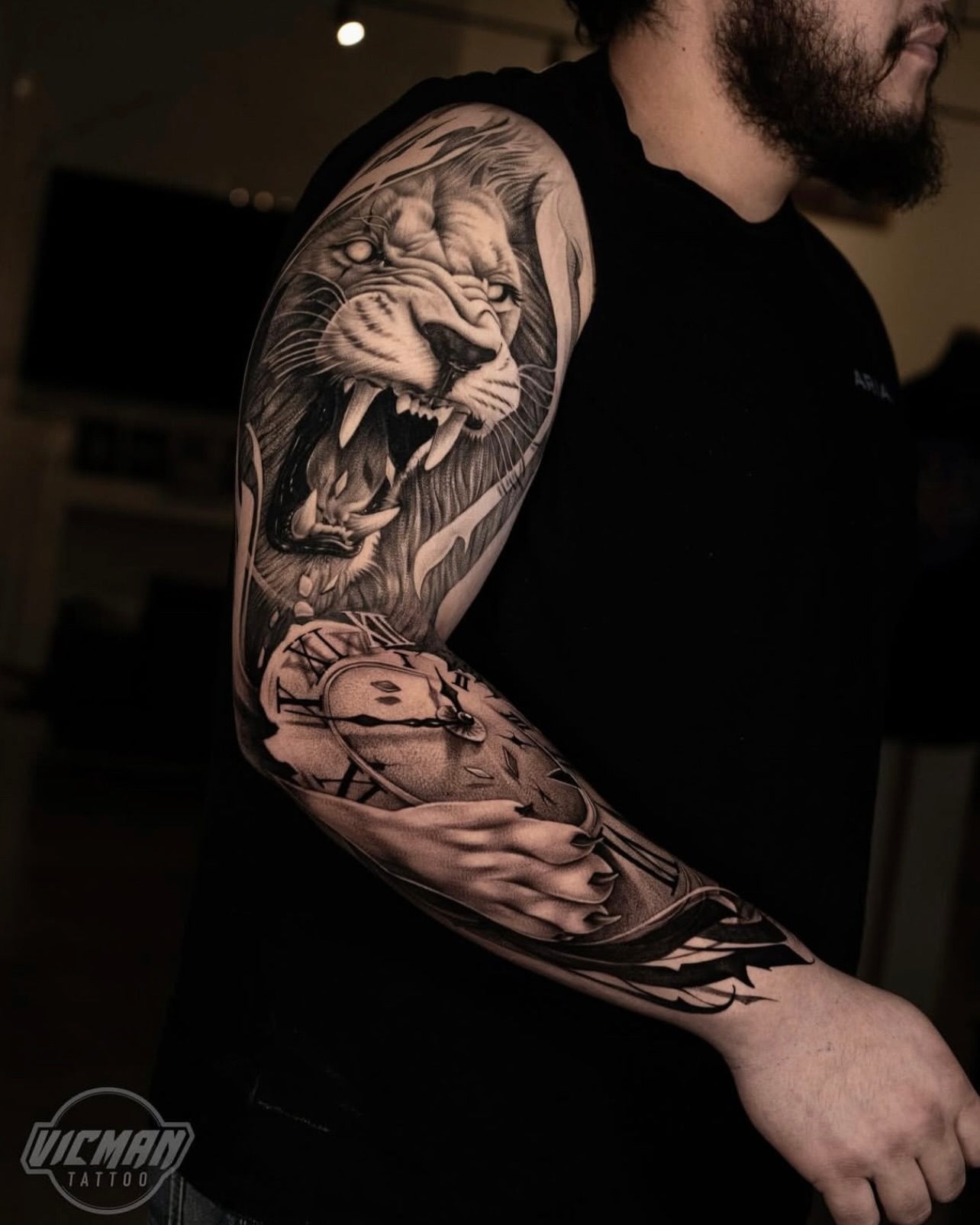 Tattoo by @vicmantattooartist — realism, black_and_grey