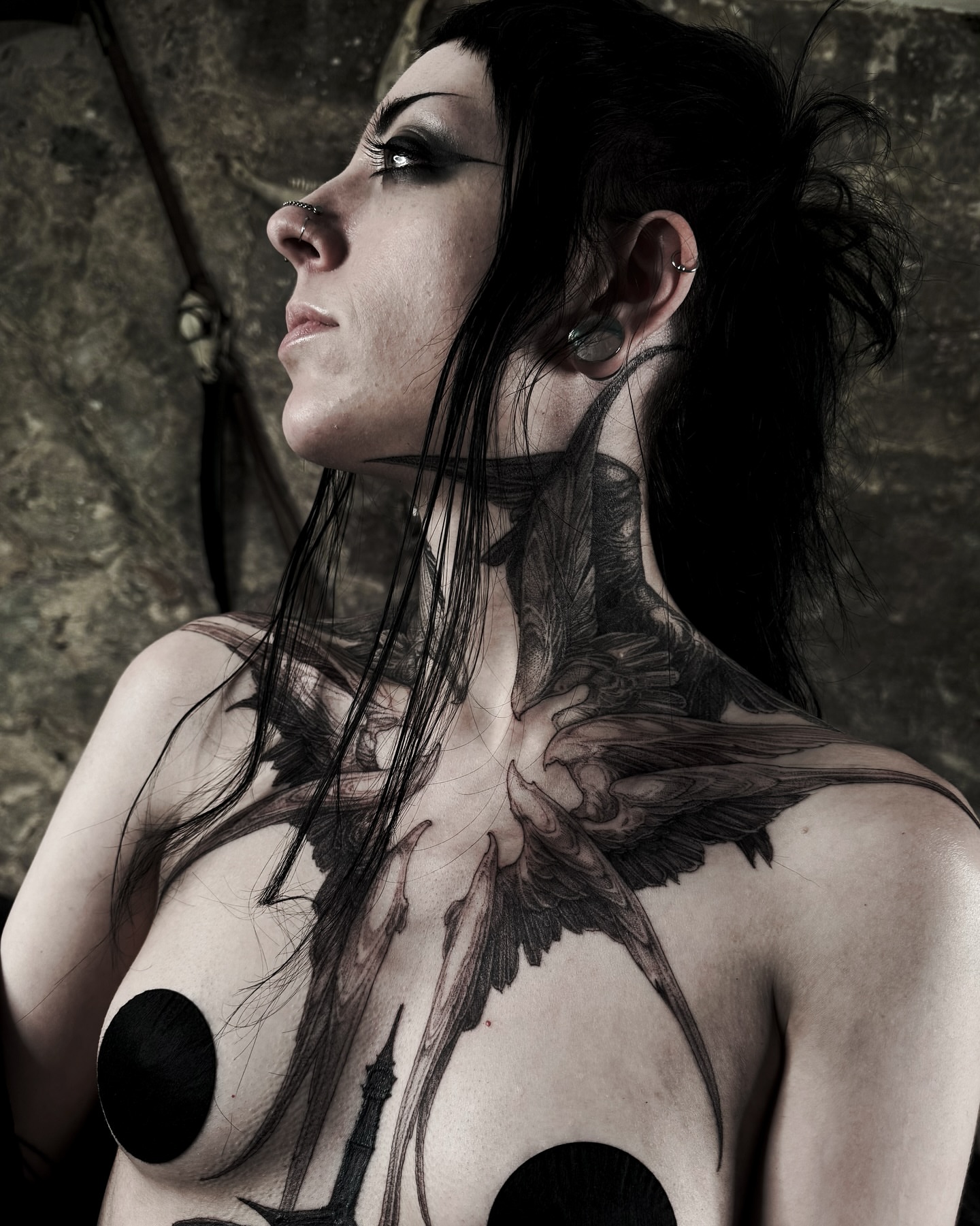 Bird black and grey tattoo on the chest by Galen