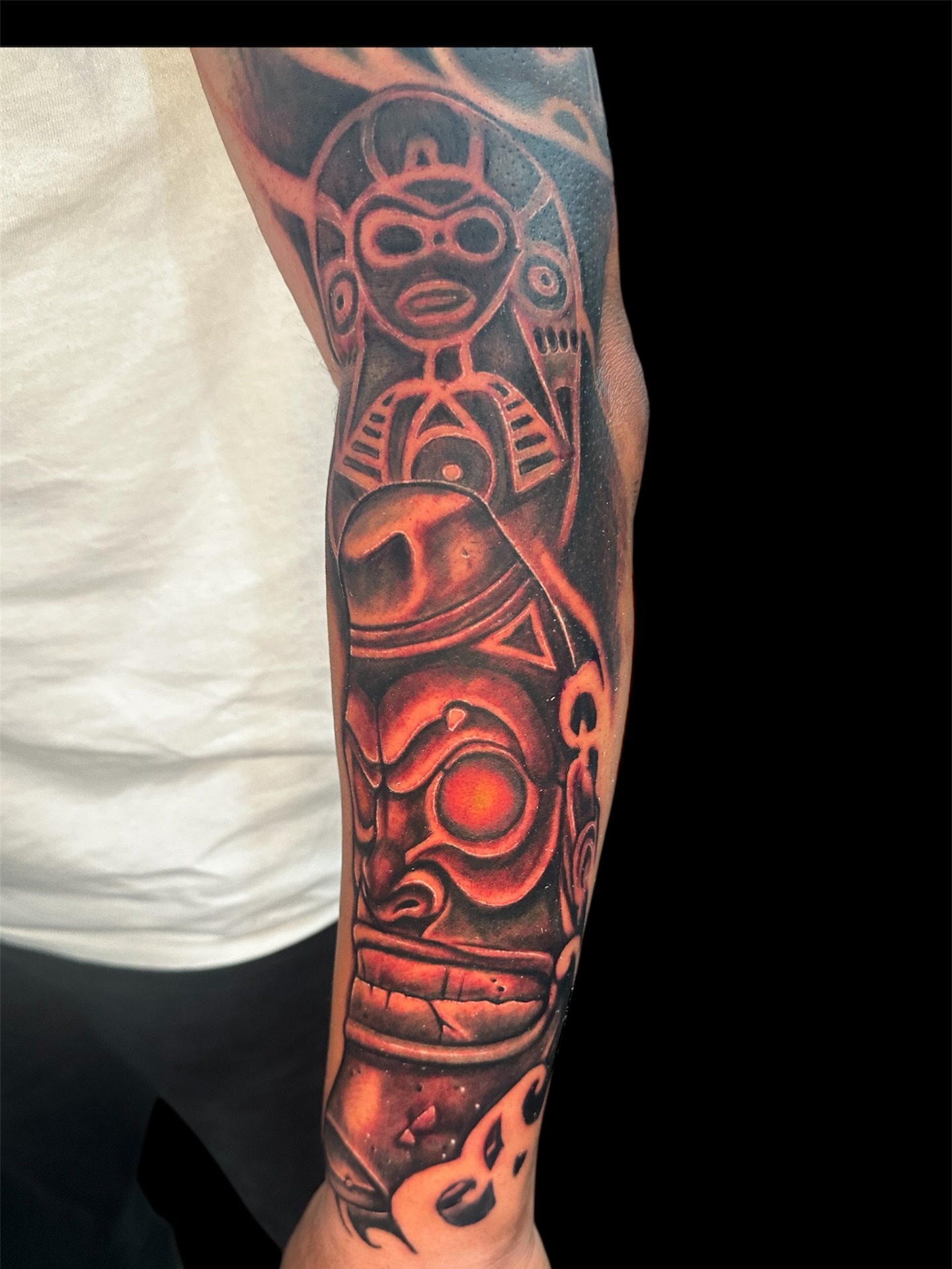 Ancient mask tribal tattoo on the forearm by Joe 💭👁