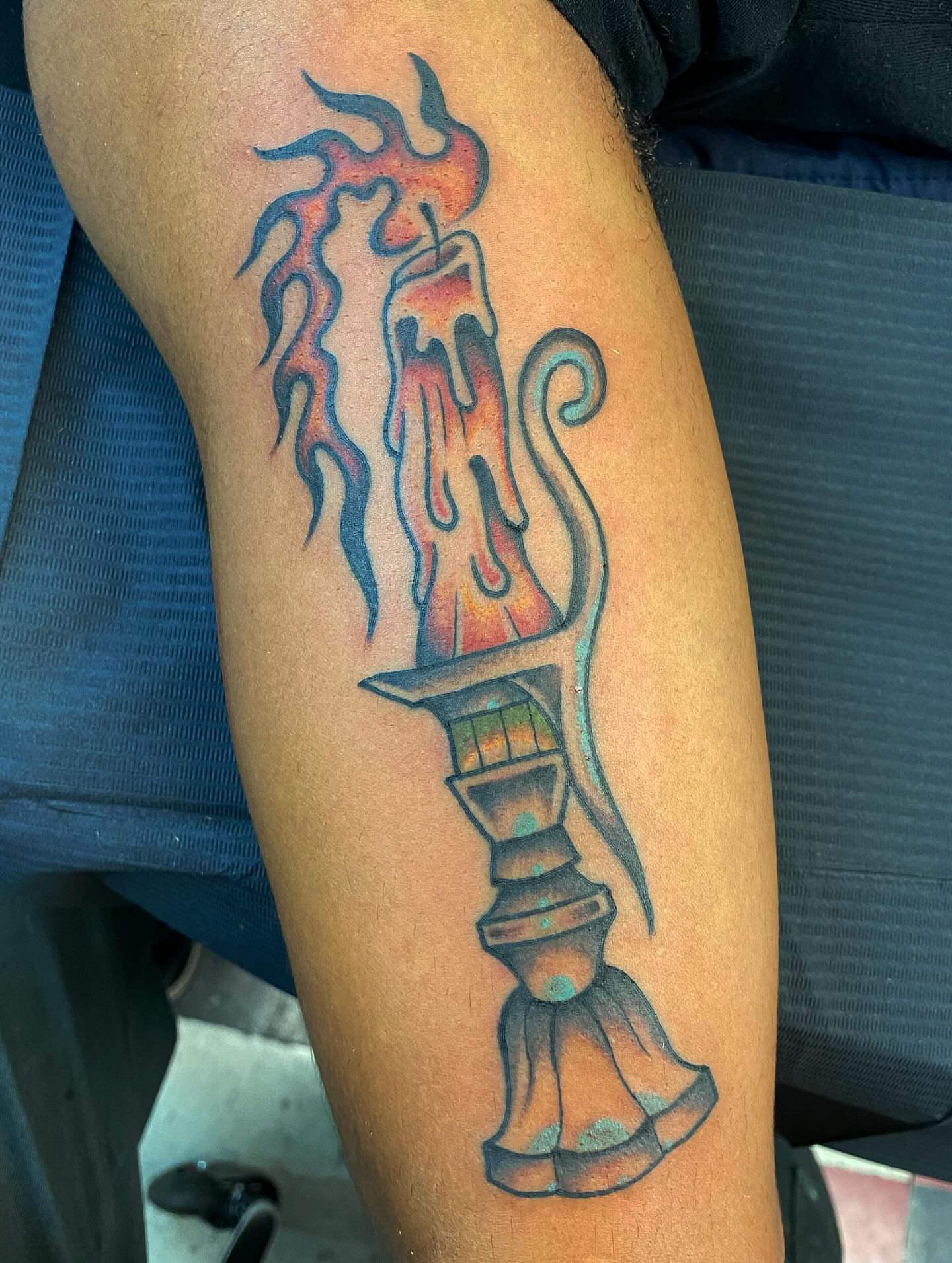 Candle holder neo-traditional tattoo on the forearm by Jonah