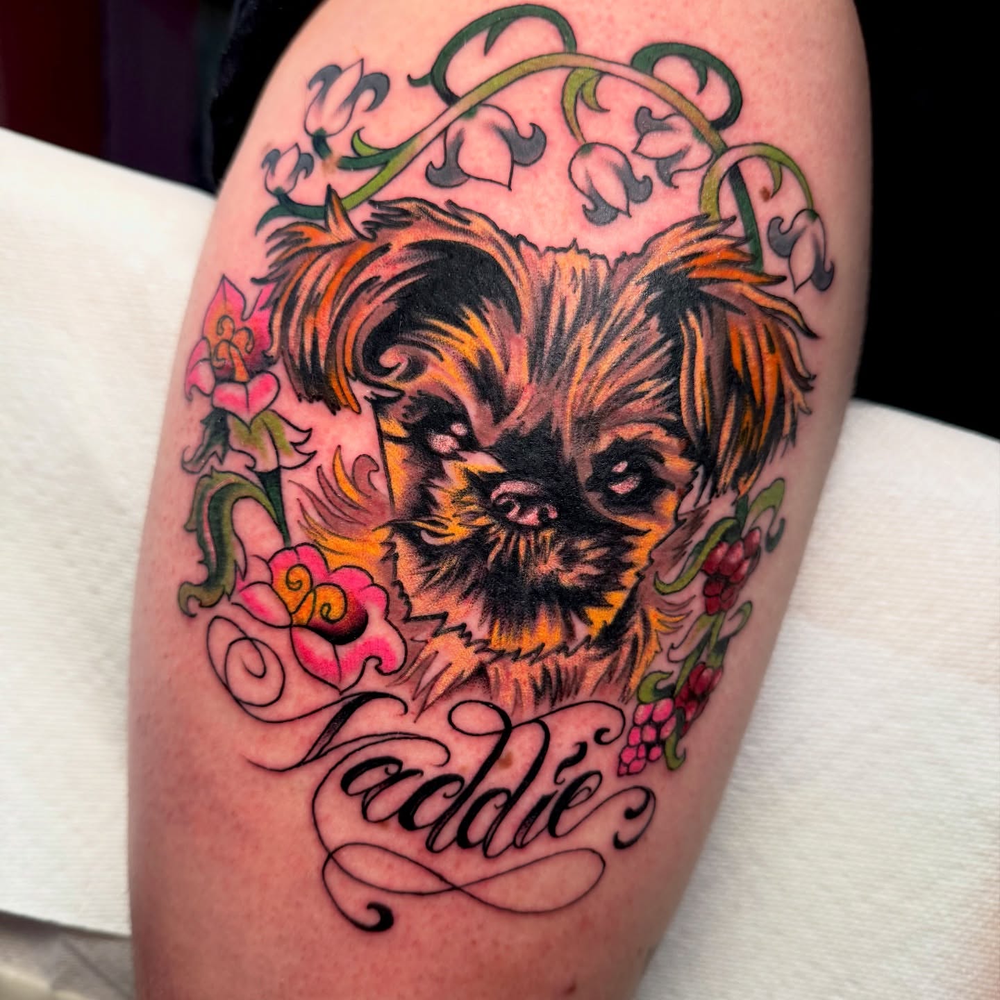 Dog portrait realism tattoo on the thigh by sydtatz