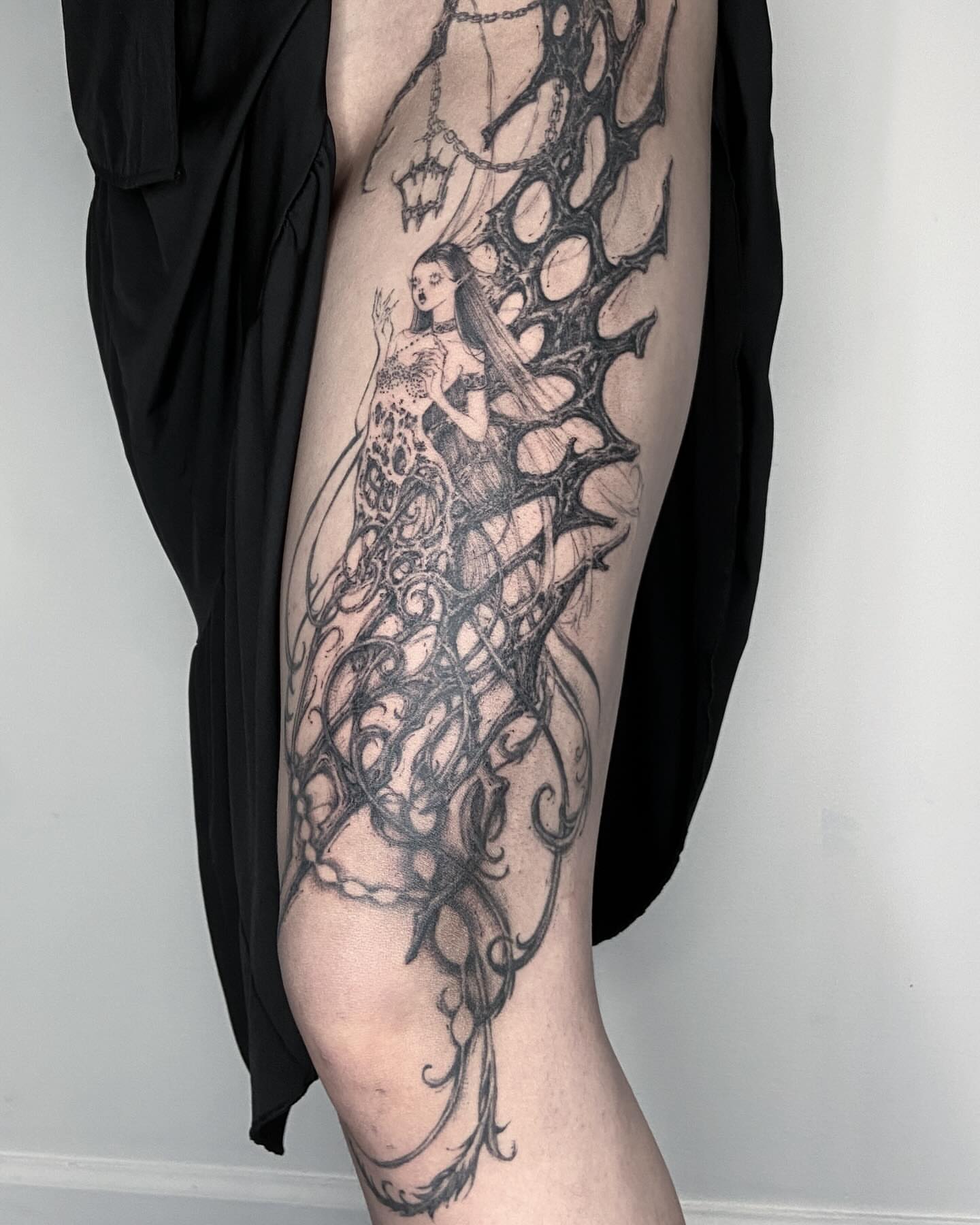 Woman entangled in web dark realism tattoo on the thigh by ༒ ₐₙ𝓰ₑₗₐ  ༒