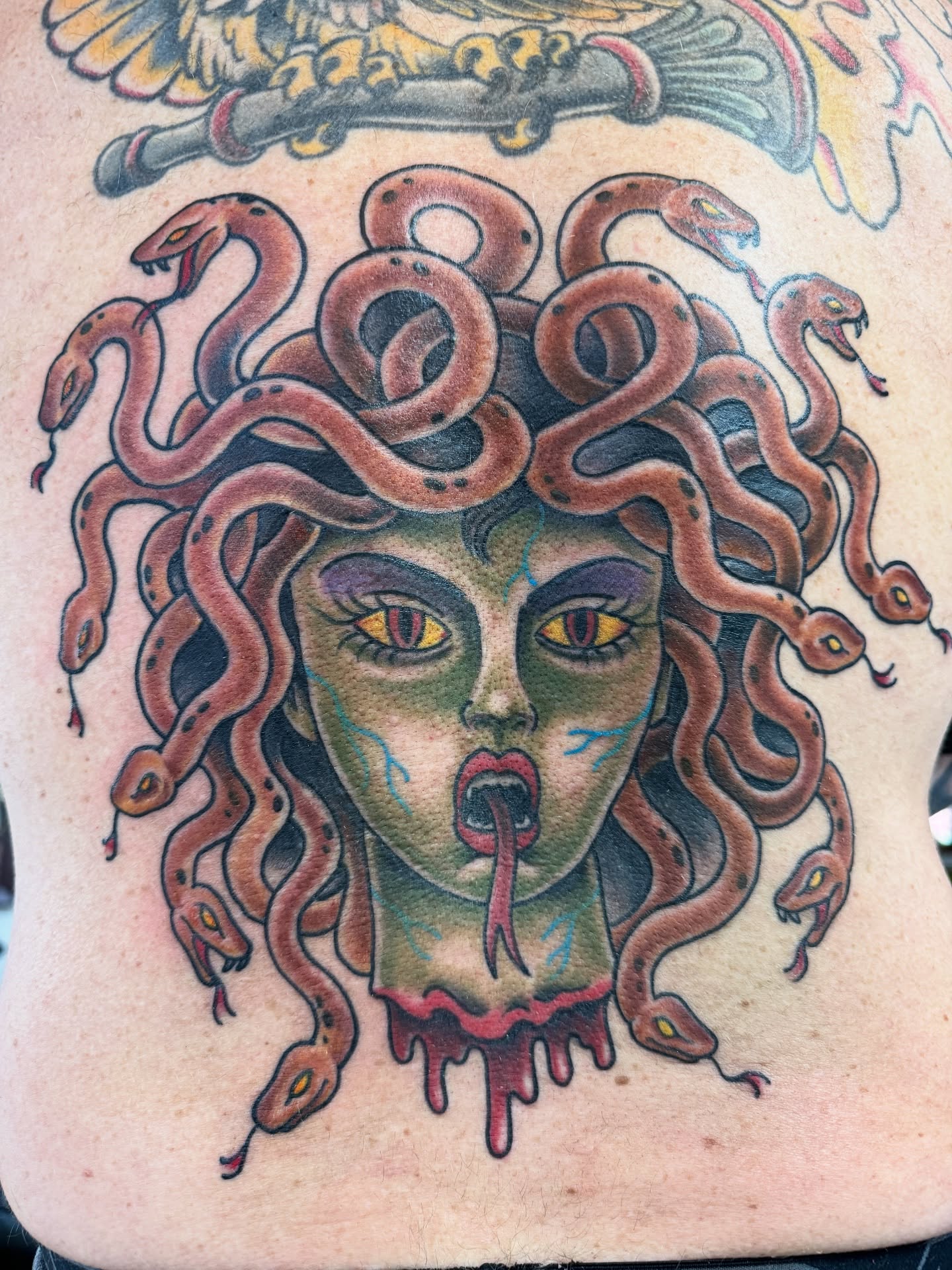 Medusa American traditional tattoo on the torso by Cary Aldridge