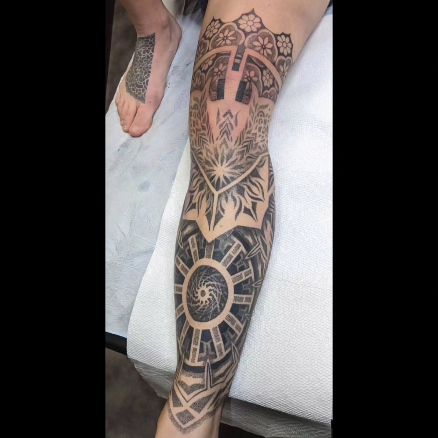 Geometric design geometric tattoo on the calf by Ed Gonzalez