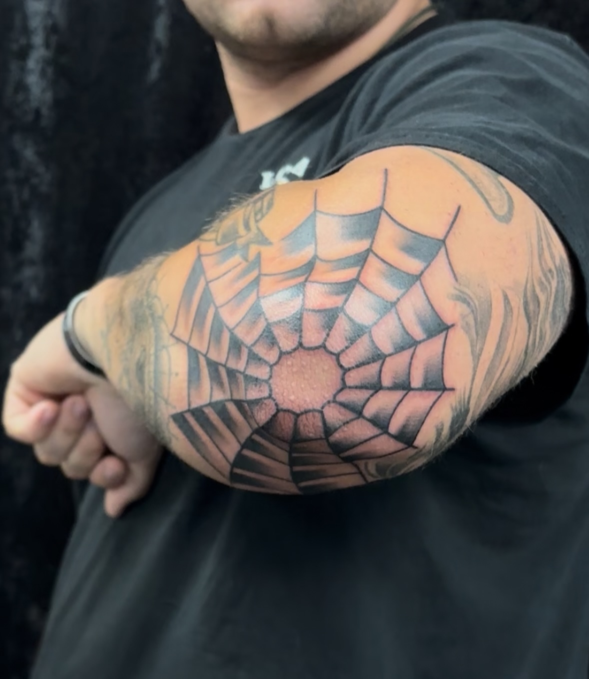 Spiderweb geometric tattoo on the forearm by @koma_tk