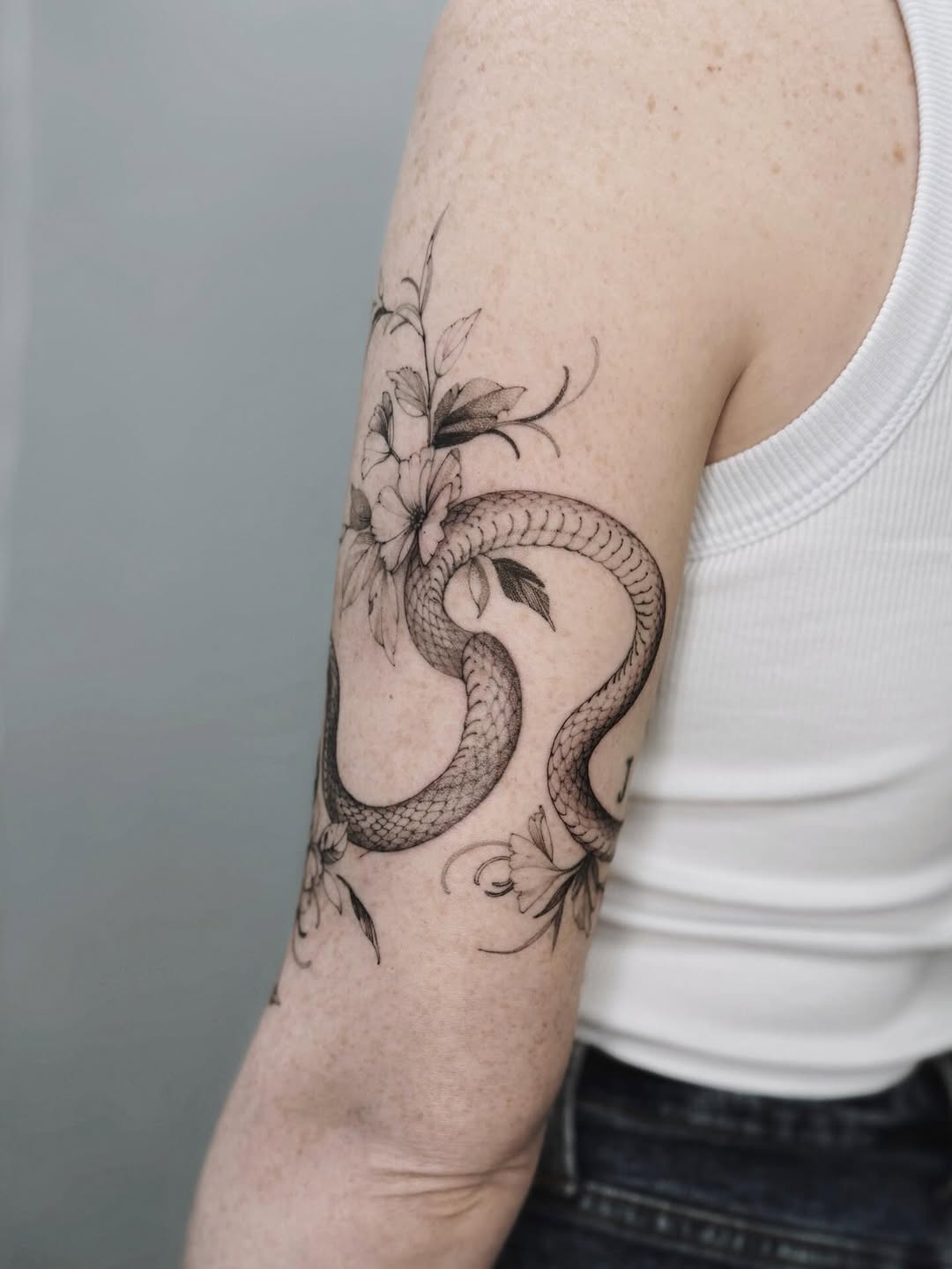 Tattoo by @angel.flow144 — fine_line, black_and_grey