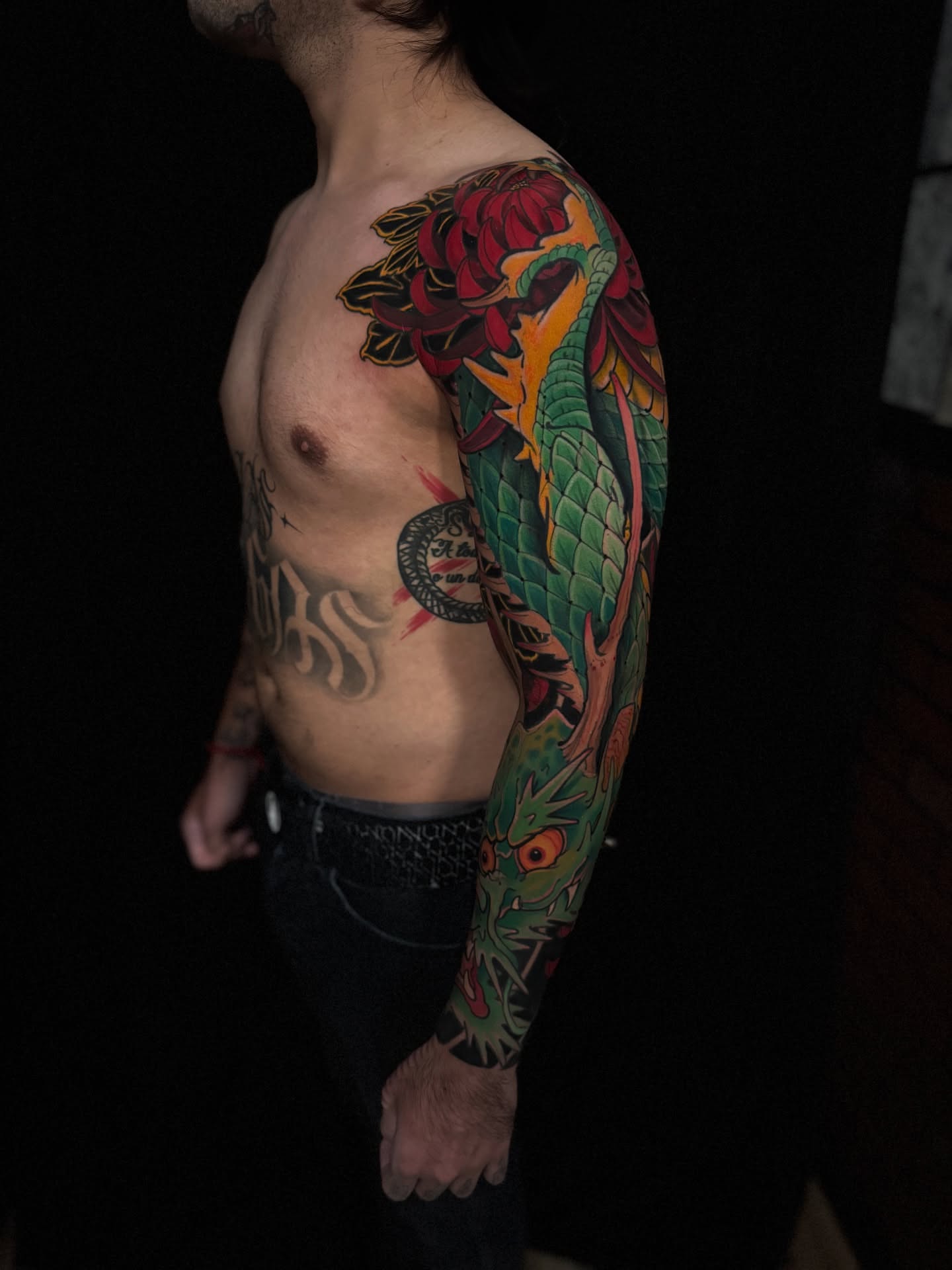 Dragon and rose japanese irezumi tattoo on the upper arm by Las Vegas Japanese Tattoo Artist, Las Vegas, Nevada