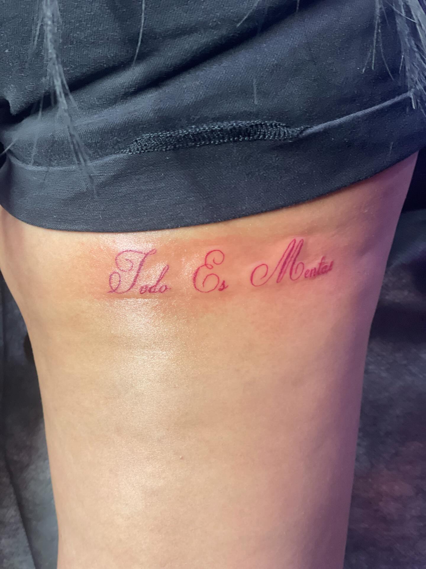 Todo Es Mentira lettering script tattoo on the thigh by 😈headhuncho😈